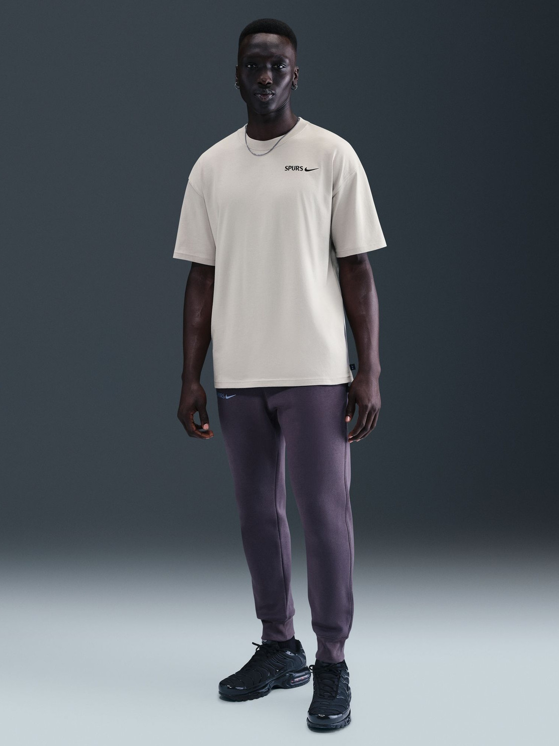 Image of NIKE Solid Men Round Neck Grey T-Shirt