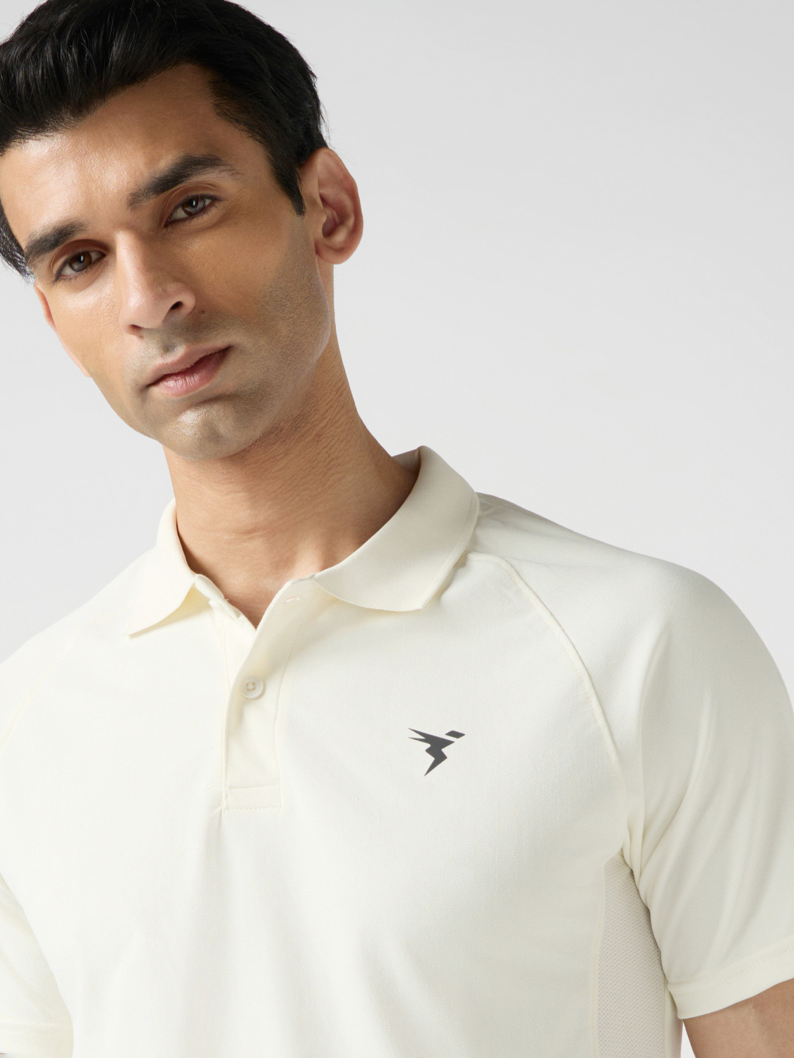 Image of TECHNOSPORT Solid Men Polo Neck White T-Shirt
