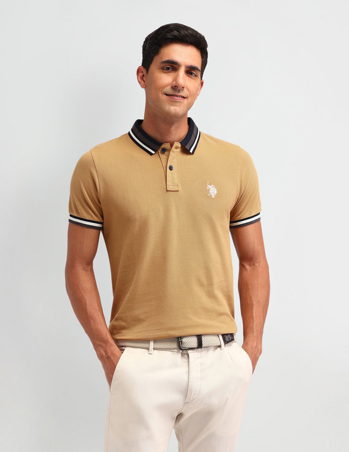 Image of U.S. POLO ASSN. Solid Men Polo Neck Brown T-Shirt