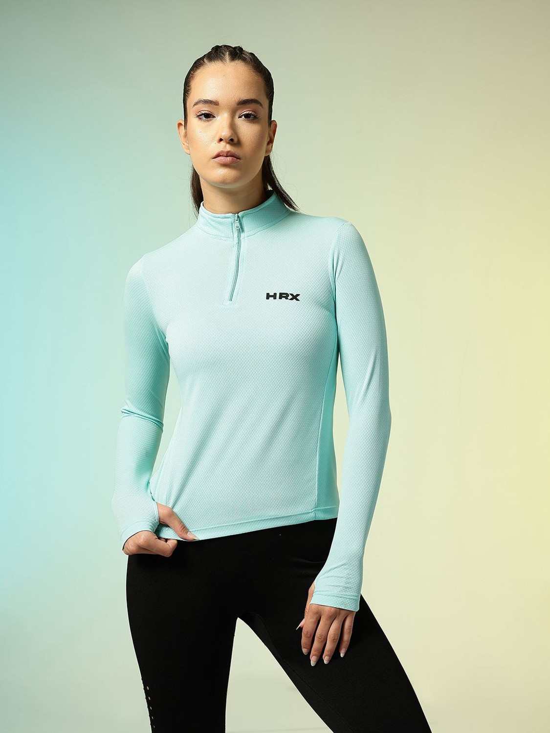 Image of HRX by Hrithik Roshan Women Printed High Neck Polyester Blue T-Shirt