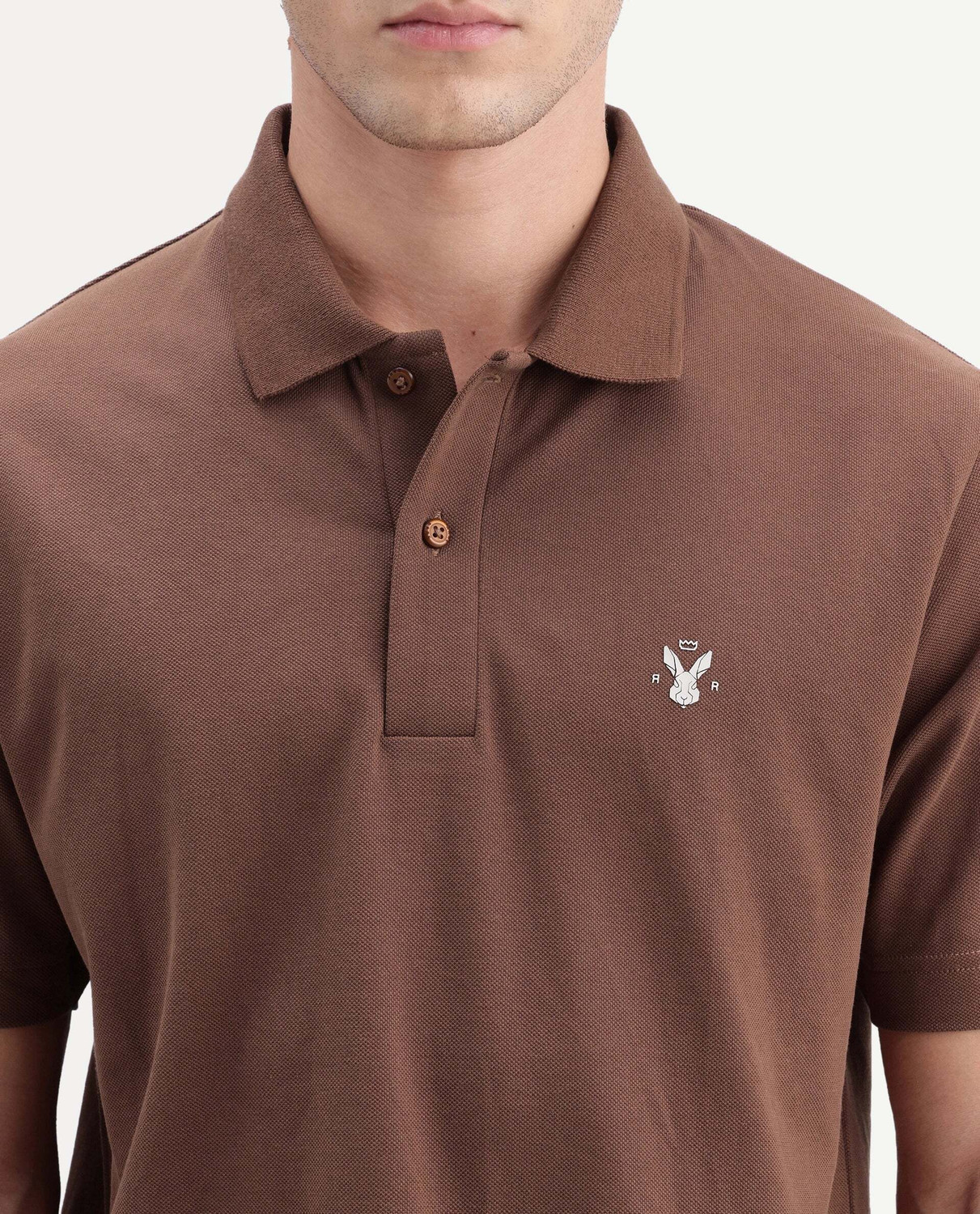 Image of RARE RABBIT Solid Men Polo Neck Brown T-Shirt