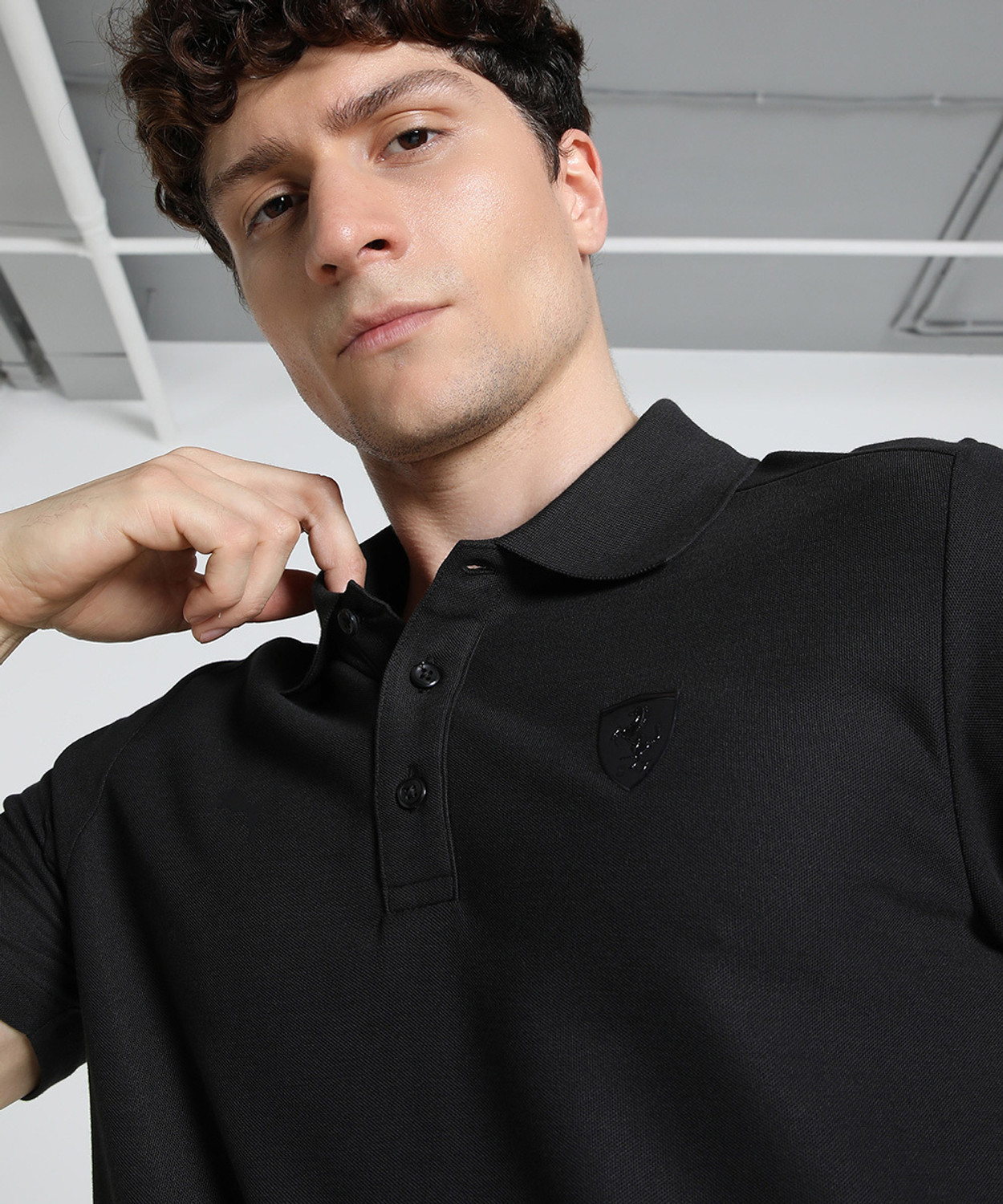 Image of PUMA Men Solid Polo Neck Pure Cotton Black T-Shirt