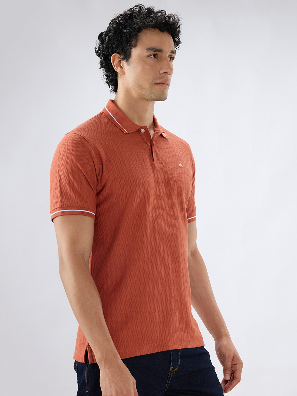 Image of Raymond Solid Men Polo Neck Orange T-Shirt