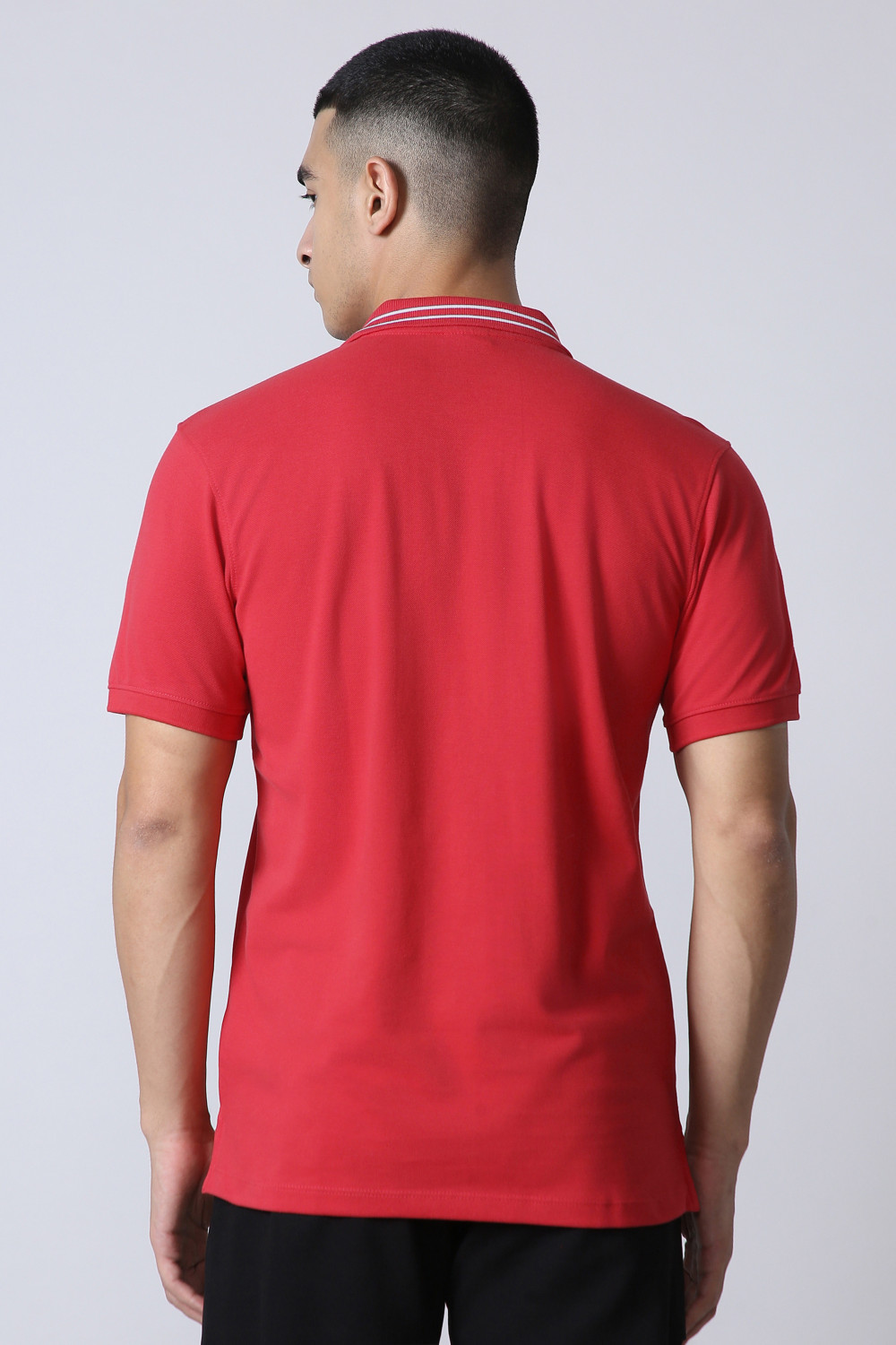 Image of REEBOK Men Solid Polo Neck Polyester Red T-Shirt