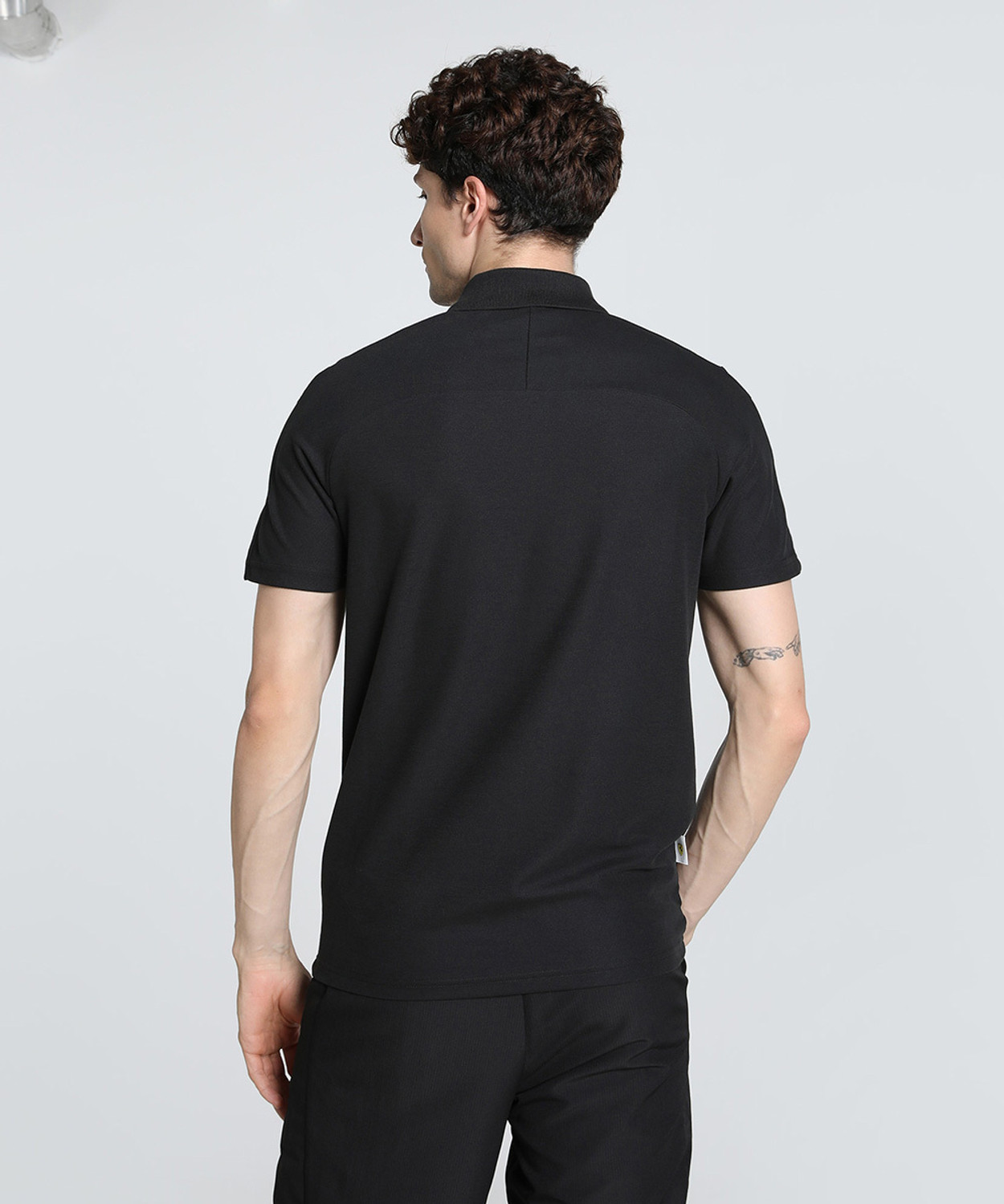 Image of PUMA Men Solid Polo Neck Pure Cotton Black T-Shirt