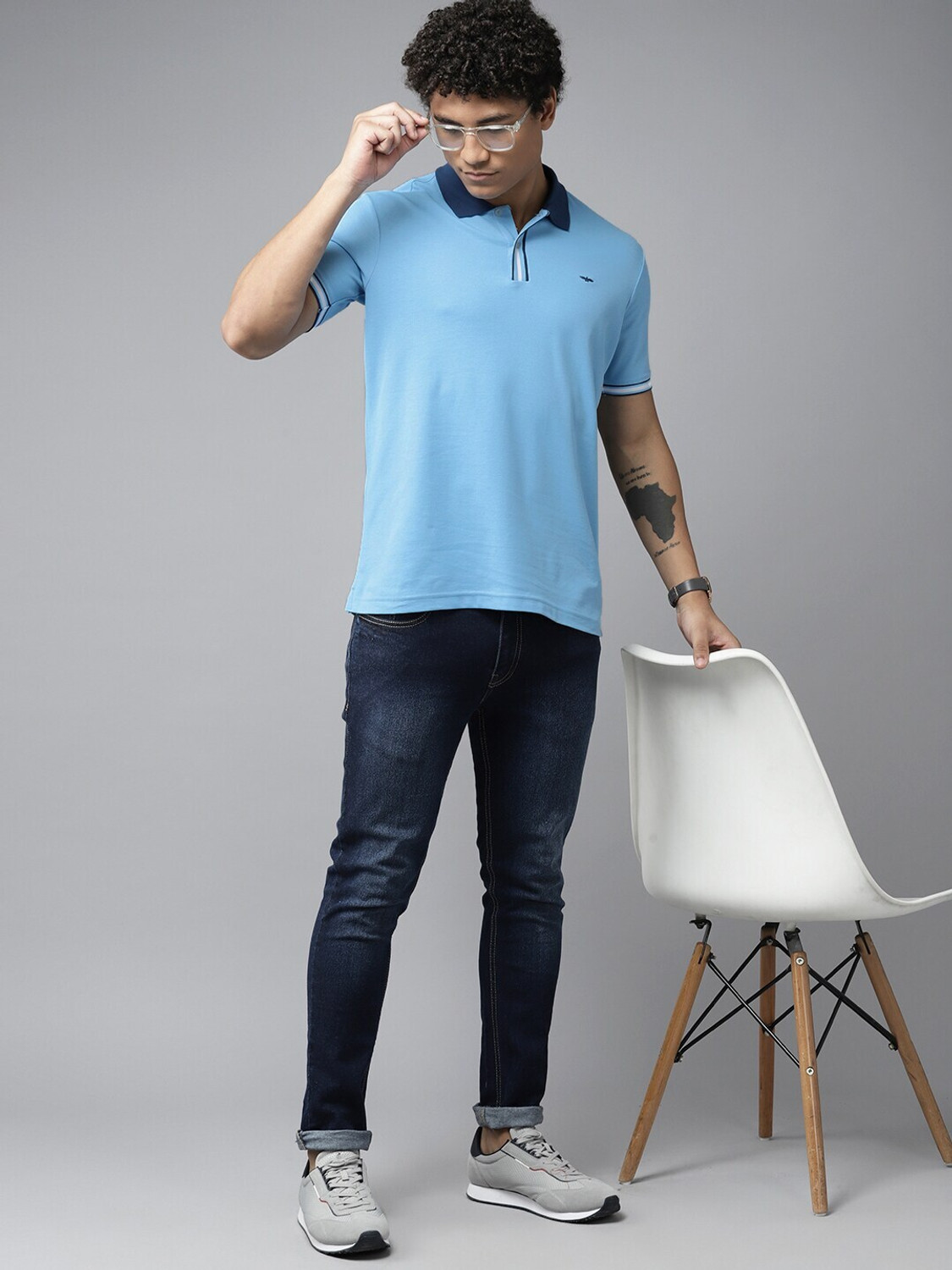 Image of PARK AVENUE Men Solid Polo Neck Cotton Blend Blue T-Shirt