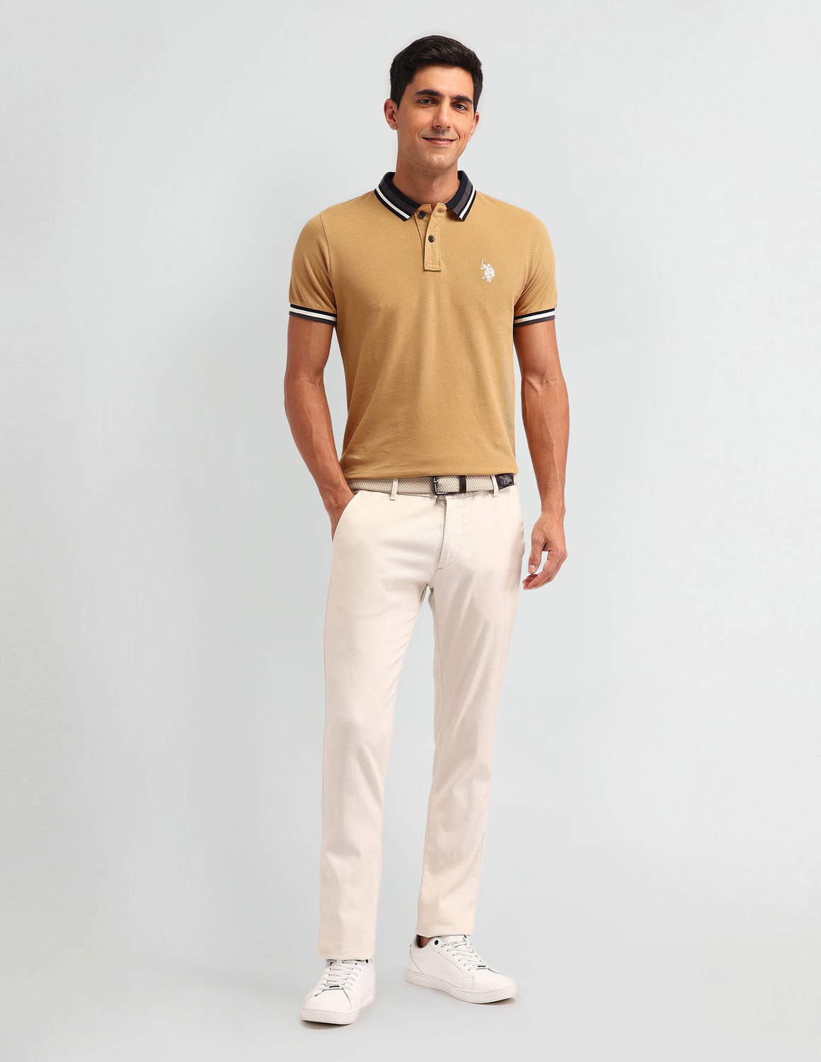 Image of U.S. POLO ASSN. Solid Men Polo Neck Brown T-Shirt
