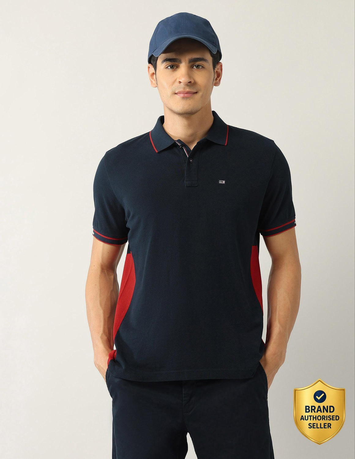 Image of Arrow Sport Solid, Colorblock Men Polo Neck Blue T-Shirt