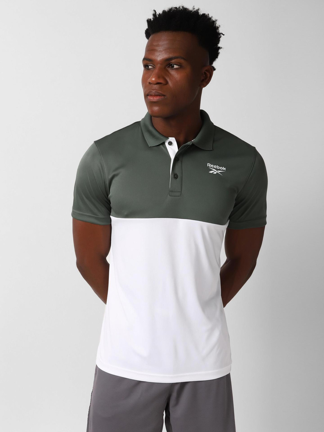 Image of REEBOK Solid Men Mandarin Collar Black T-Shirt