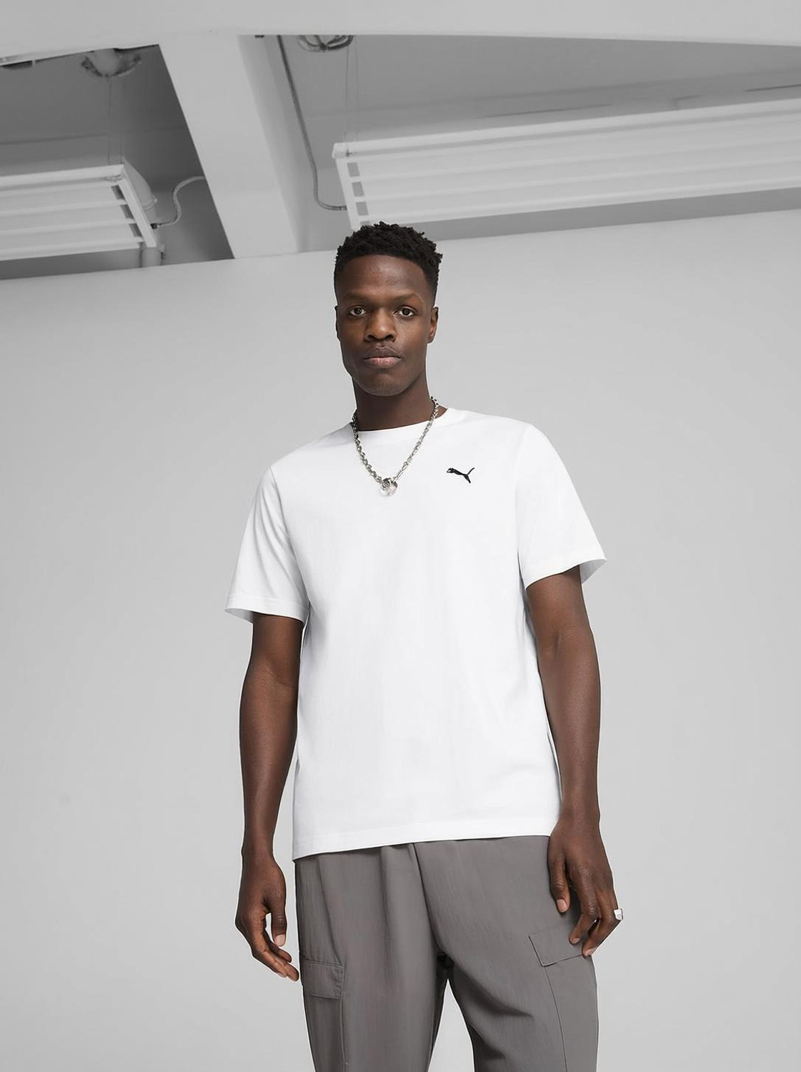 Image of PUMA Solid Men Round Neck White T-Shirt