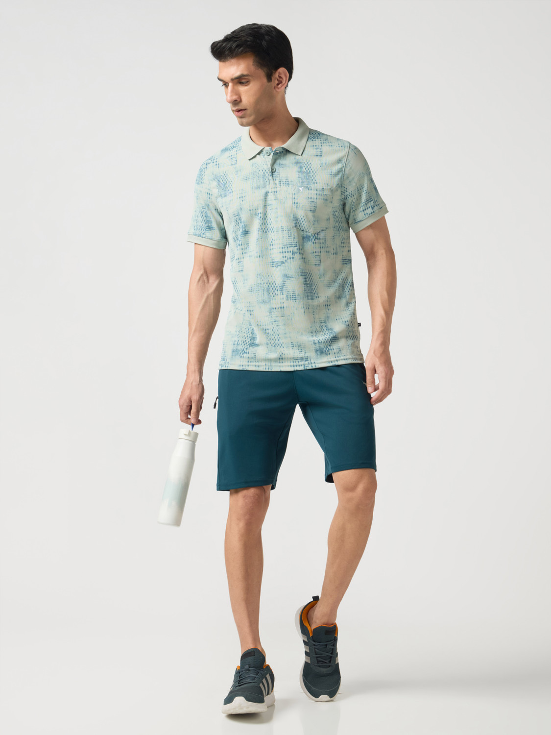 Image of TECHNOSPORT Self Design Men Polo Neck Light Green T-Shirt