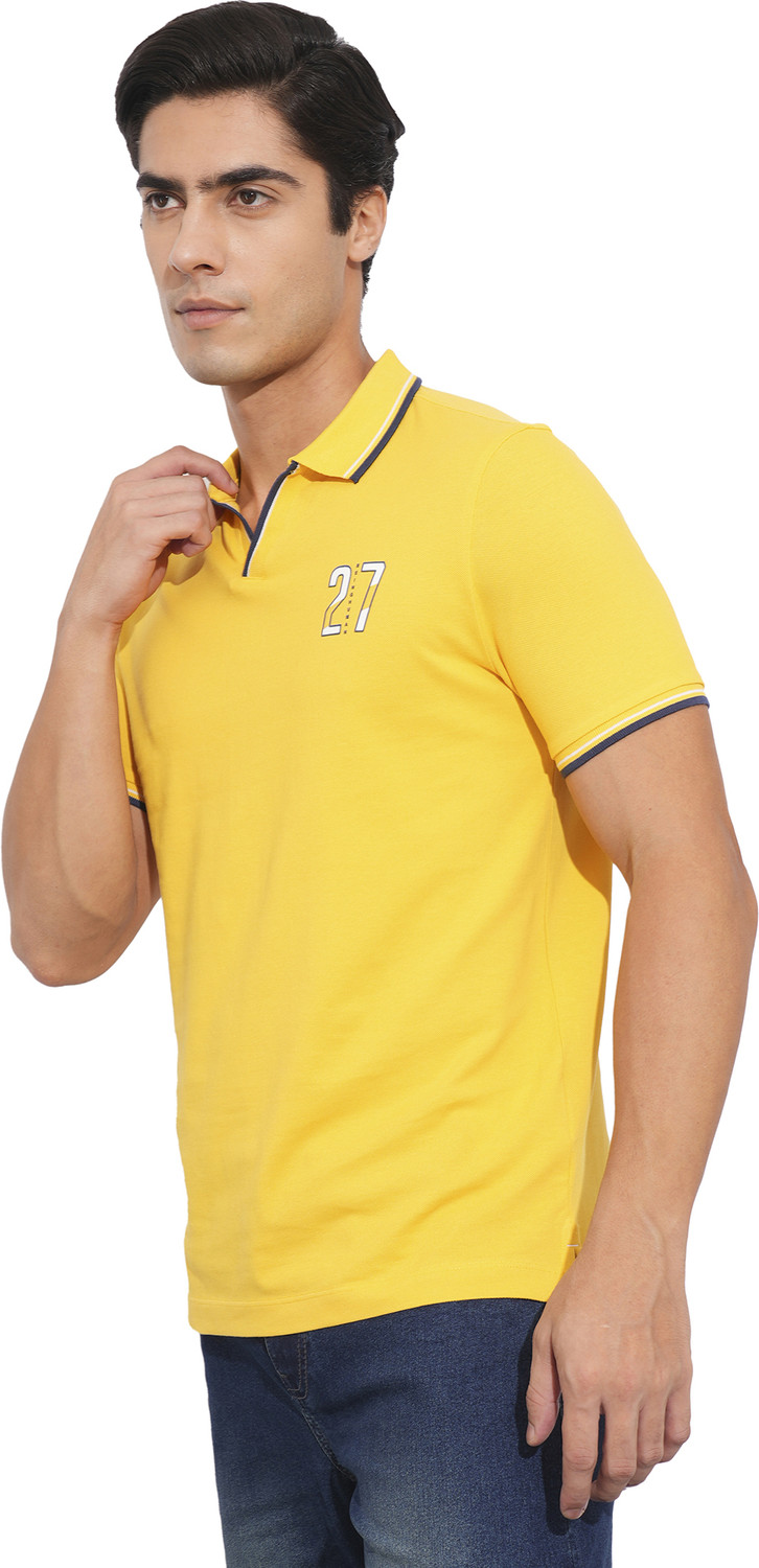 Image of BEING HUMAN Solid Men Polo Neck Yellow T-Shirt