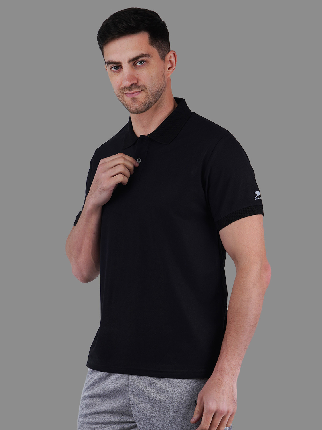 Image of Shiv Naresh Self Design Men Polo Neck Black T-Shirt