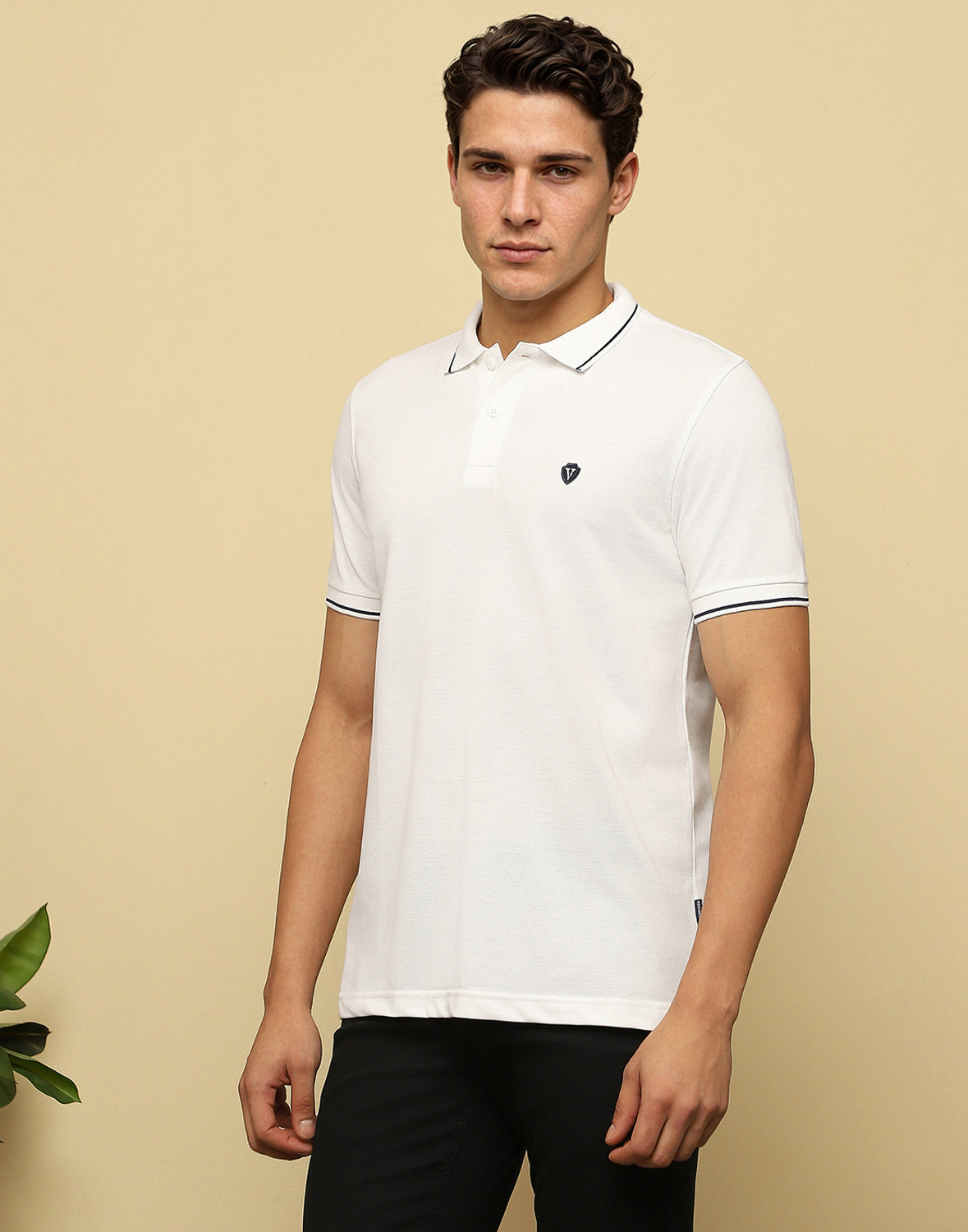 Image of VAN HEUSEN Solid Men Polo Neck White T-Shirt