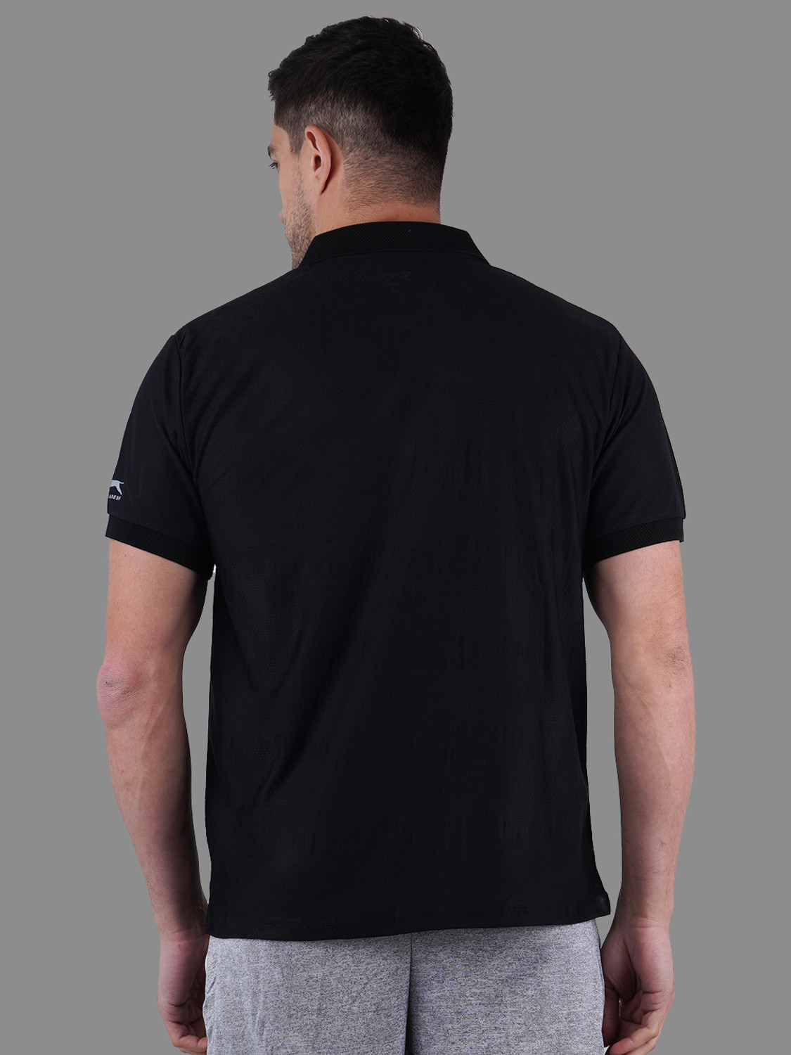 Image of Shiv Naresh Self Design Men Polo Neck Black T-Shirt
