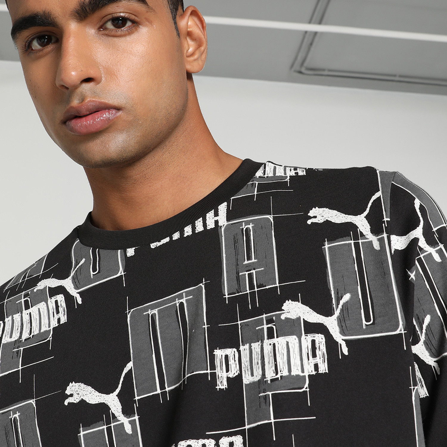 Image of PUMA Printed Men Crew Neck Black T-Shirt