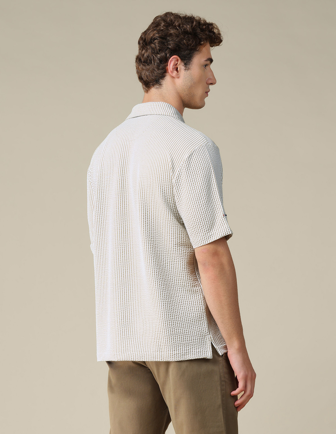 Image of U.S. Polo Assn. Denim Co. Men Self Design Polo Neck Cotton Blend Brown T-Shirt