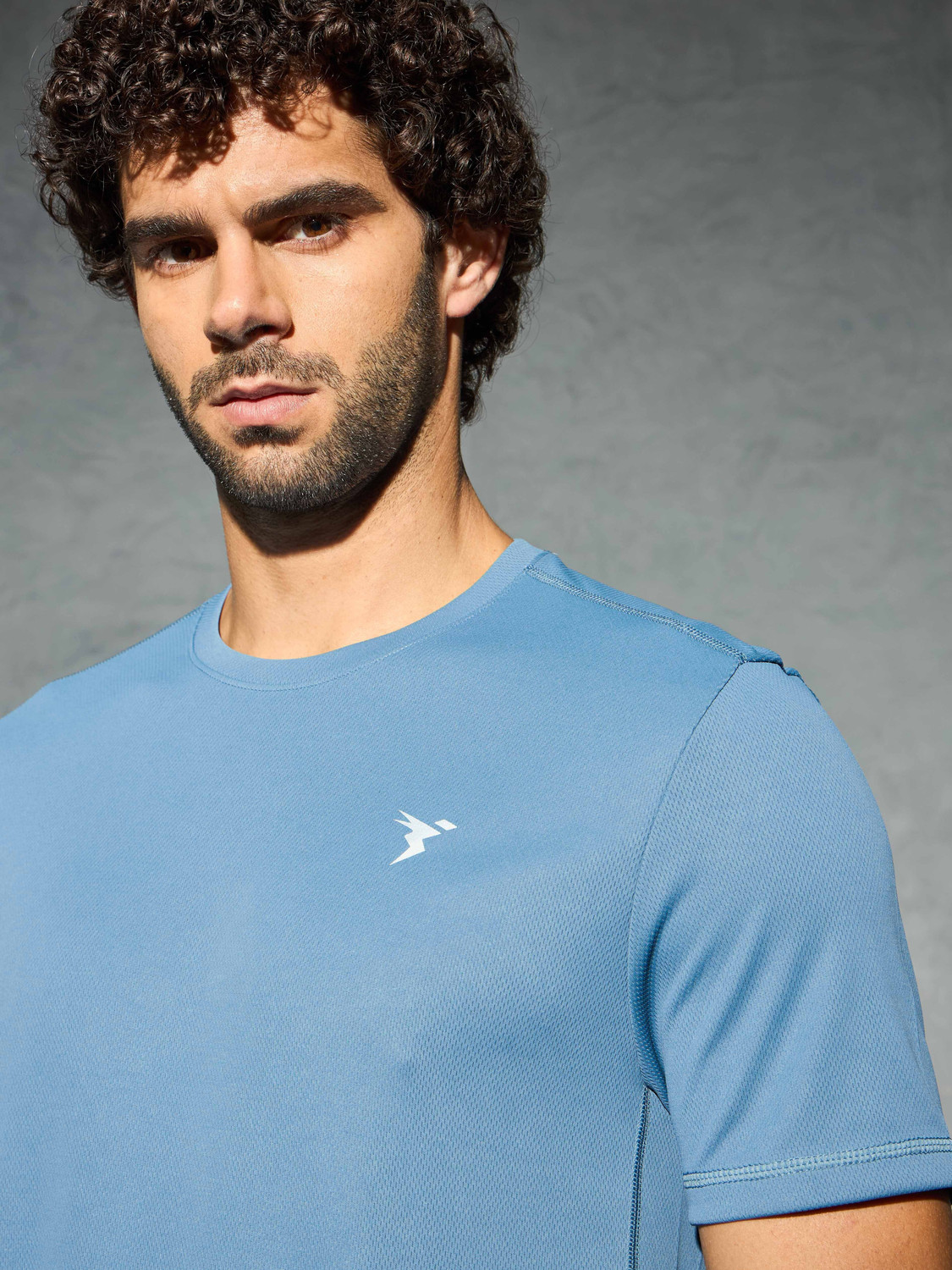 Image of TECHNOSPORT Solid Men Round Neck Blue T-Shirt