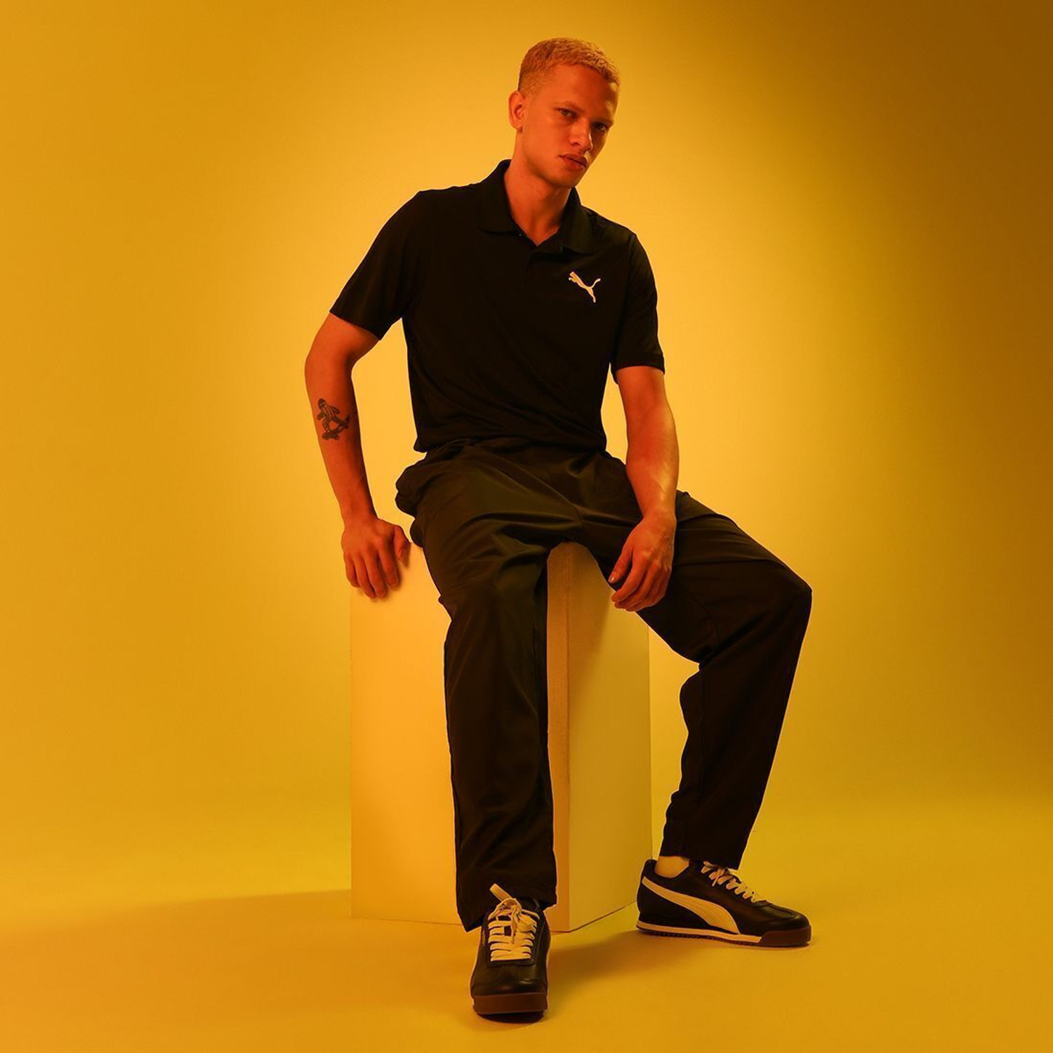 Image of PUMA Solid Men Polo Neck Black T-Shirt
