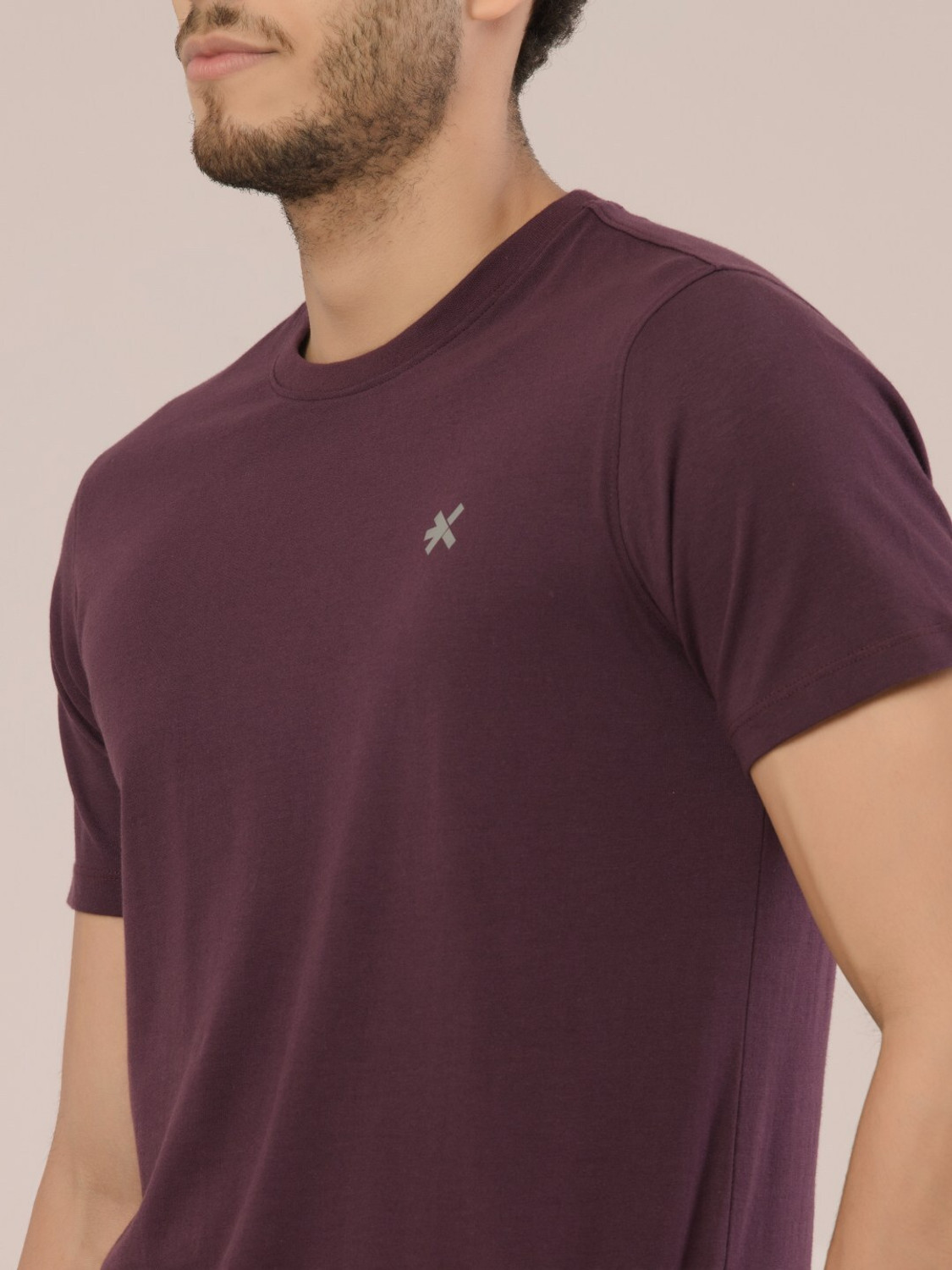 Image of HRX by Hrithik Roshan Solid Men Round Neck Purple T-Shirt