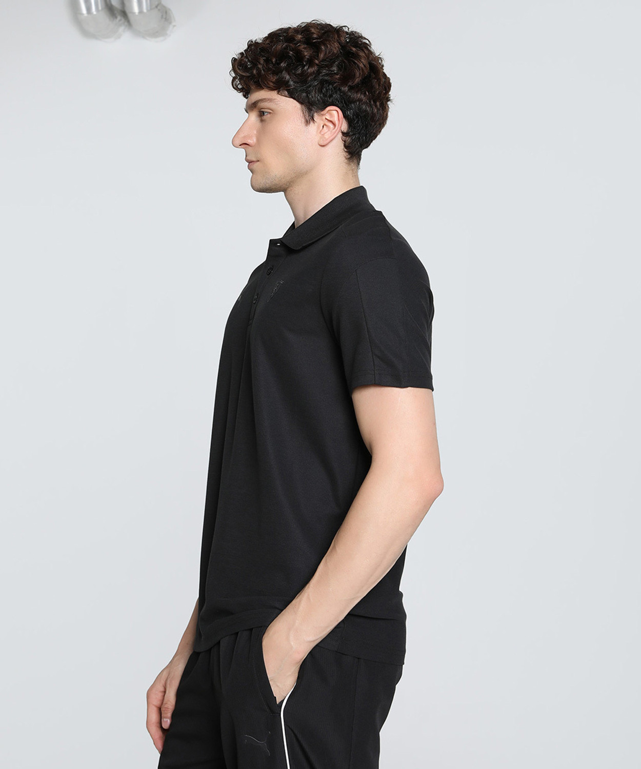 Image of PUMA Men Solid Polo Neck Pure Cotton Black T-Shirt