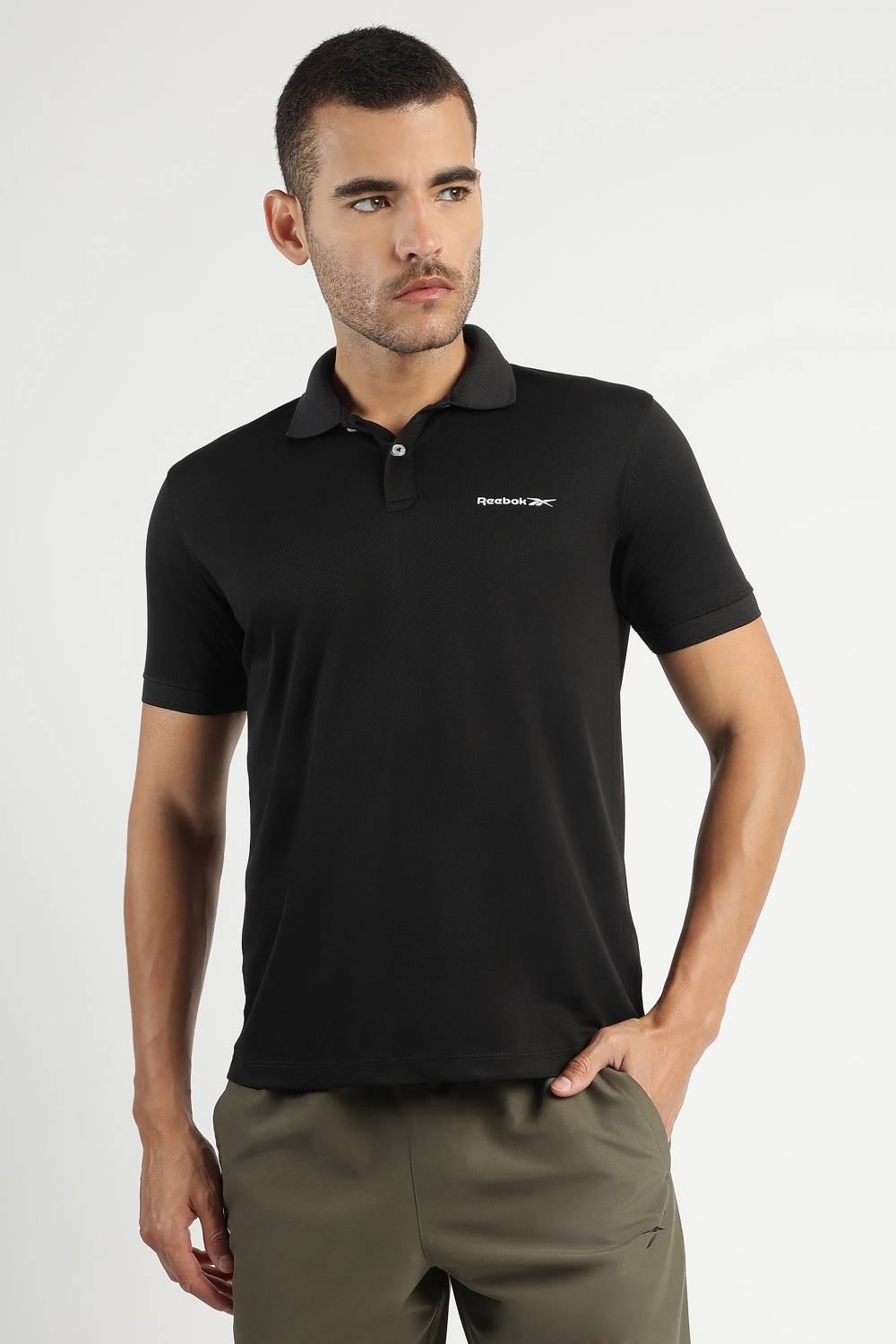 REEBOK Men Solid Polo Neck Polyester Black T-Shirt