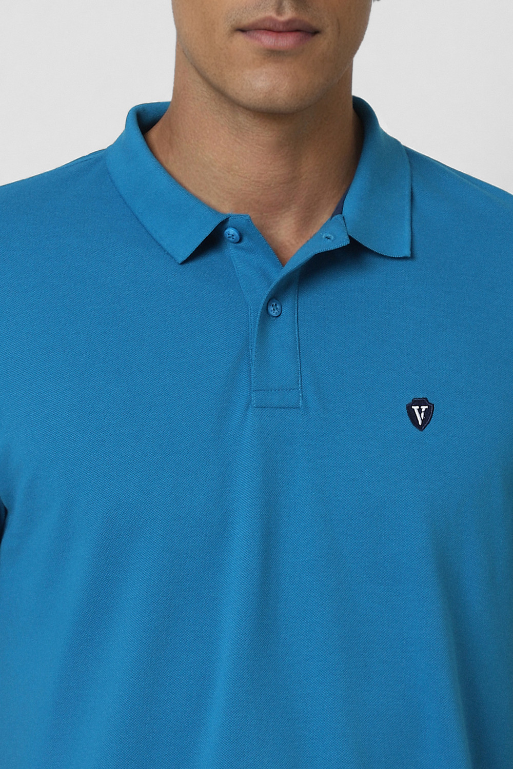 Image of VAN HEUSEN SPORT Self Design Men Polo Neck Blue T-Shirt