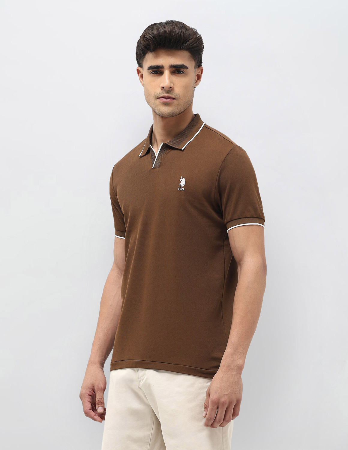 Image of U.S. POLO ASSN. Solid Men Polo Neck Brown T-Shirt