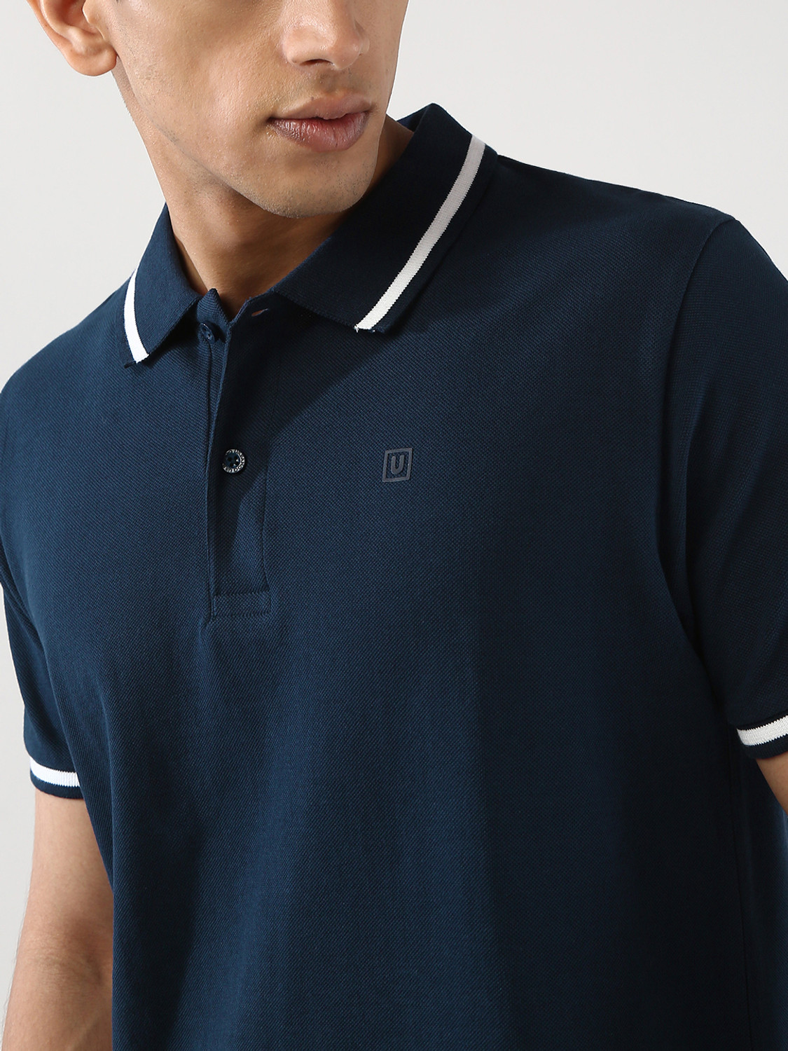 Image of Urbano Fashion Solid Men Polo Neck Dark Blue T-Shirt
