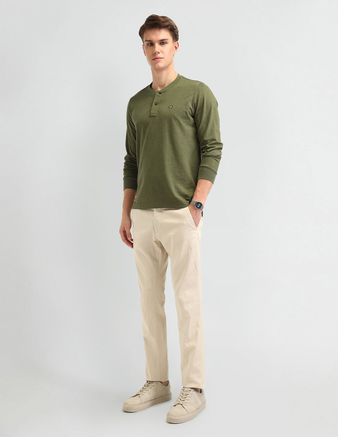 Image of Arrow Sport Solid Men Henley Neck Green T-Shirt