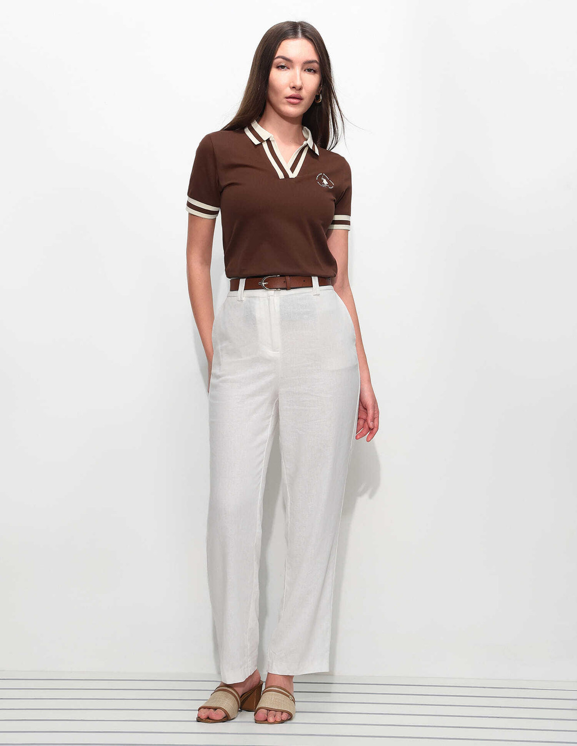 Image of U.S. POLO ASSN. Solid Women Polo Neck Brown T-Shirt
