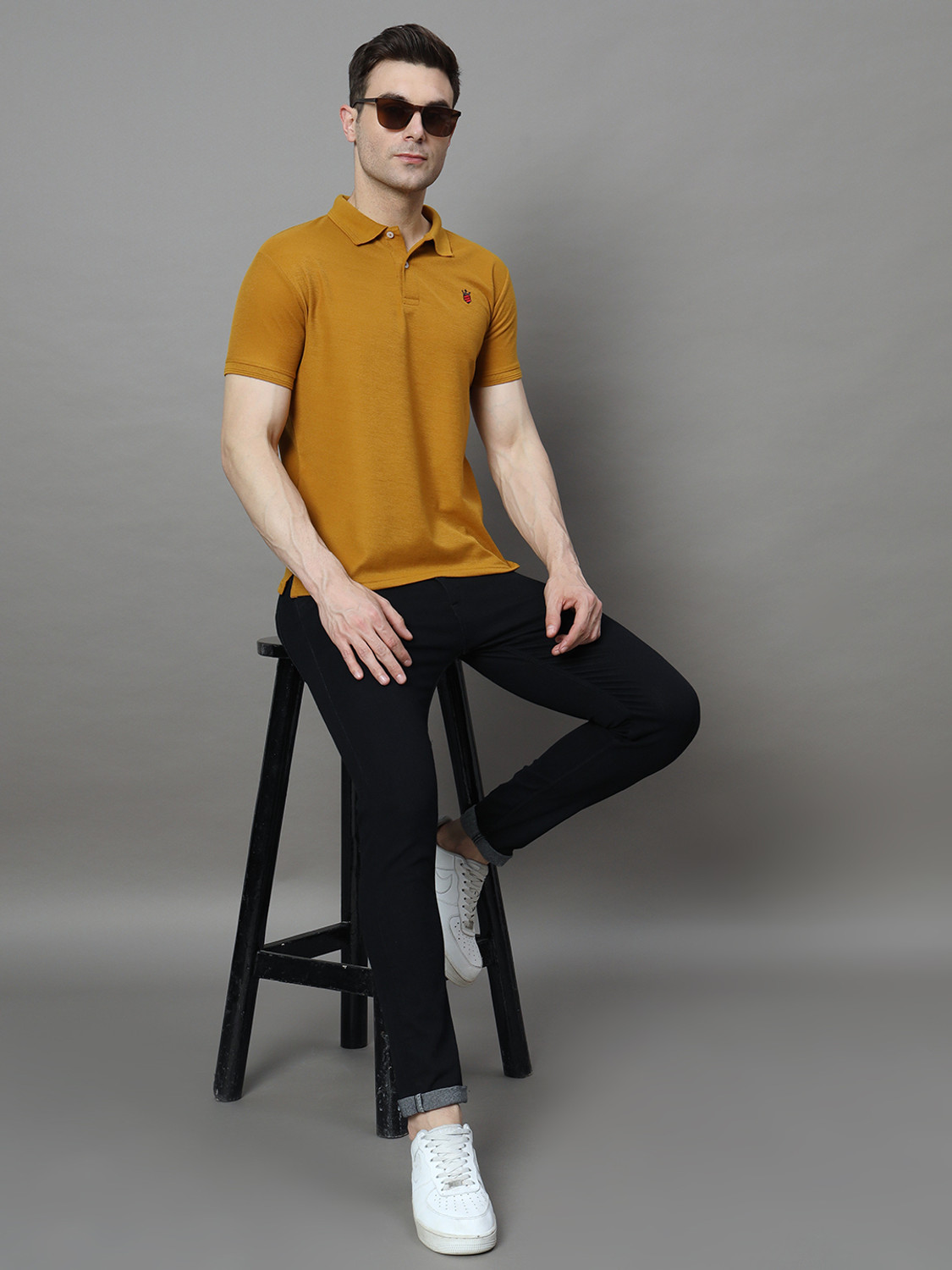 Image of RARHANPREMIUM Solid Men Polo Neck Yellow T-Shirt