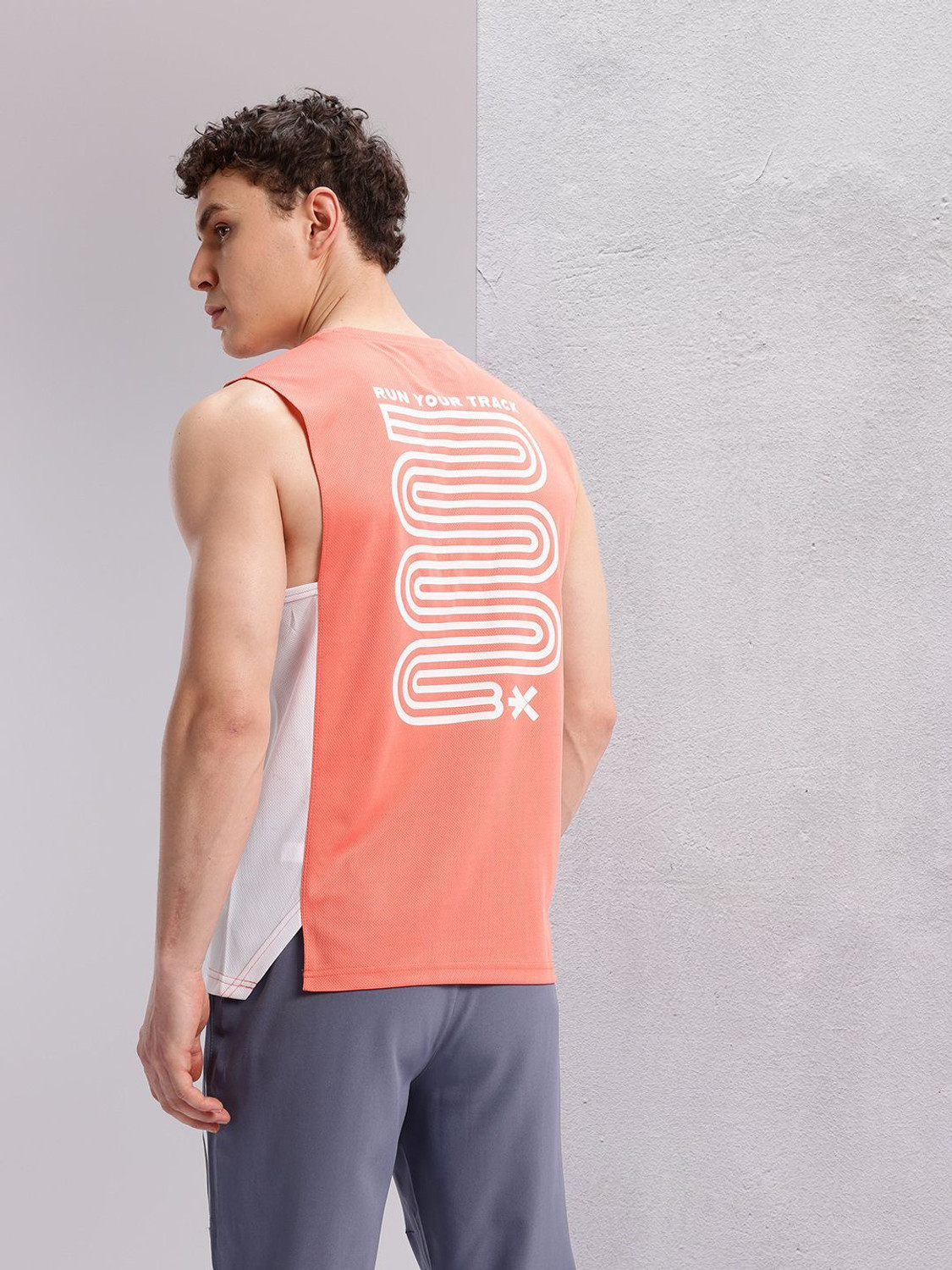 Image of HRX by Hrithik Roshan Printed Men Round Neck Orange T-Shirt