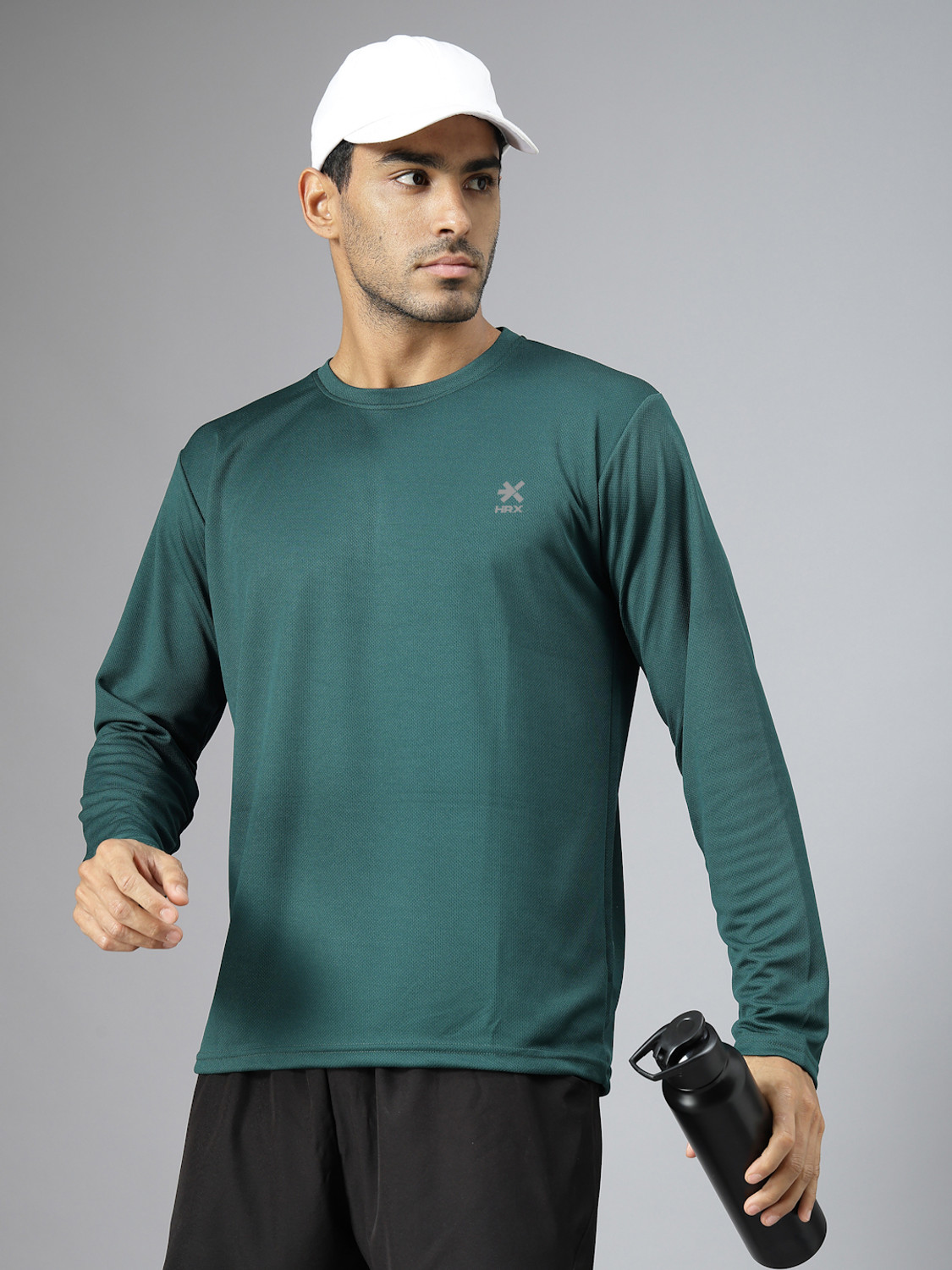 Image of HRX by Hrithik Roshan Solid Men Round Neck Green T-Shirt