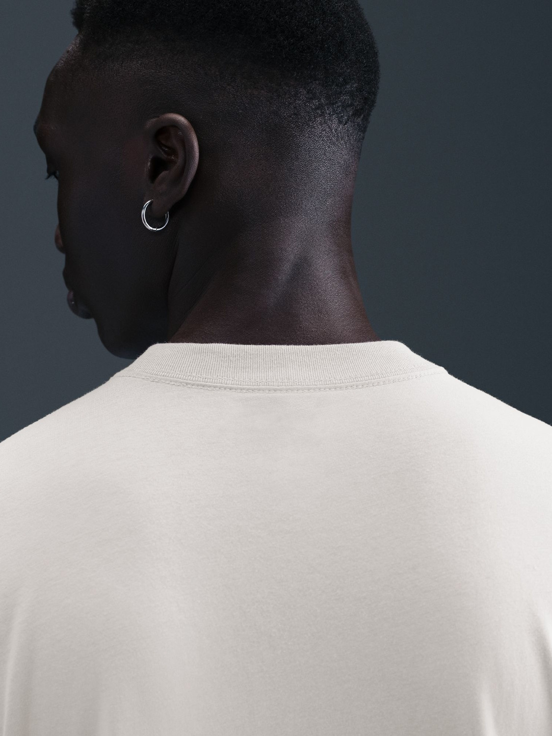 Image of NIKE Solid Men Round Neck Grey T-Shirt