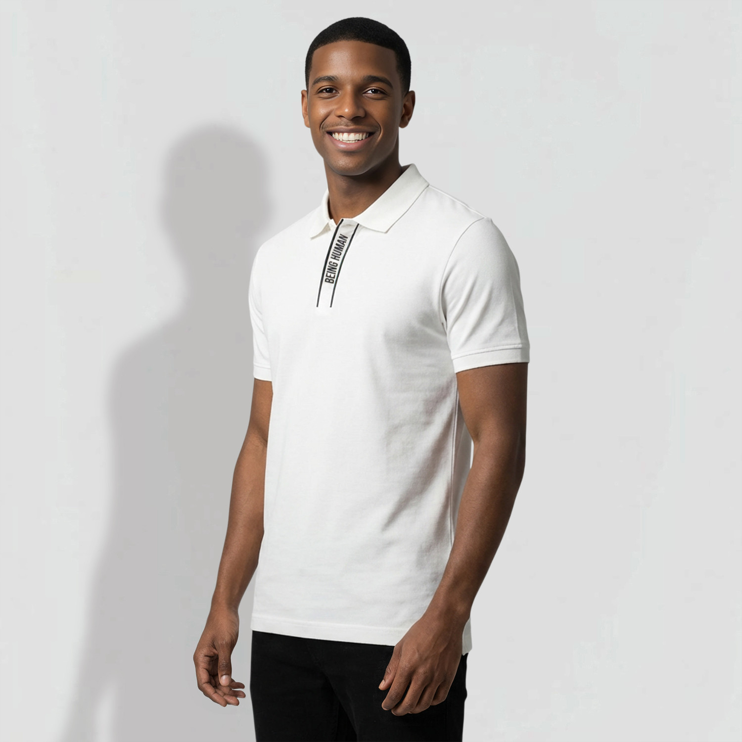 Image of BEING HUMAN Men Solid Polo Neck Cotton Blend White T-Shirt
