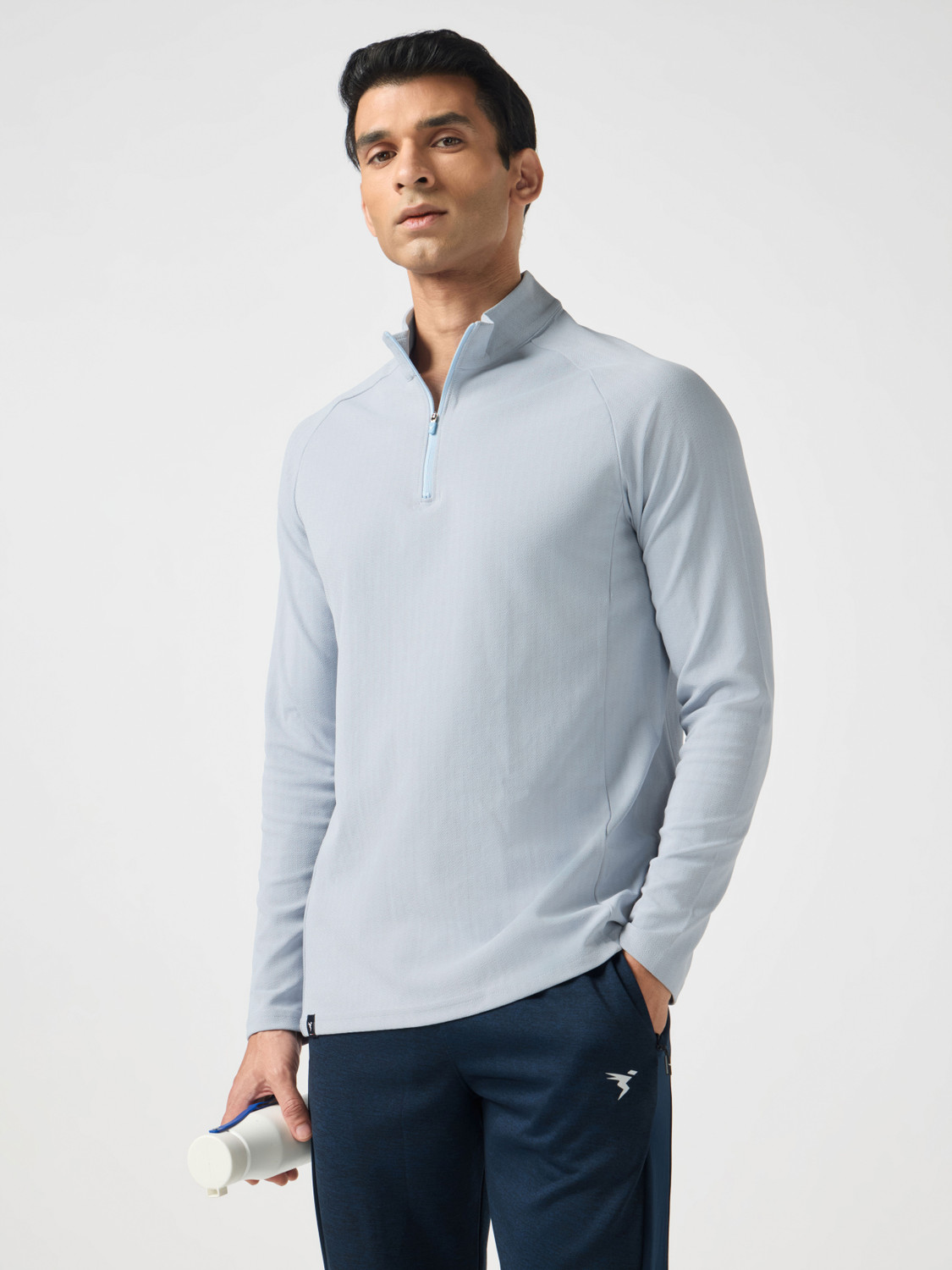 Image of TECHNOSPORT Solid Men Zip Neck Light Blue T-Shirt