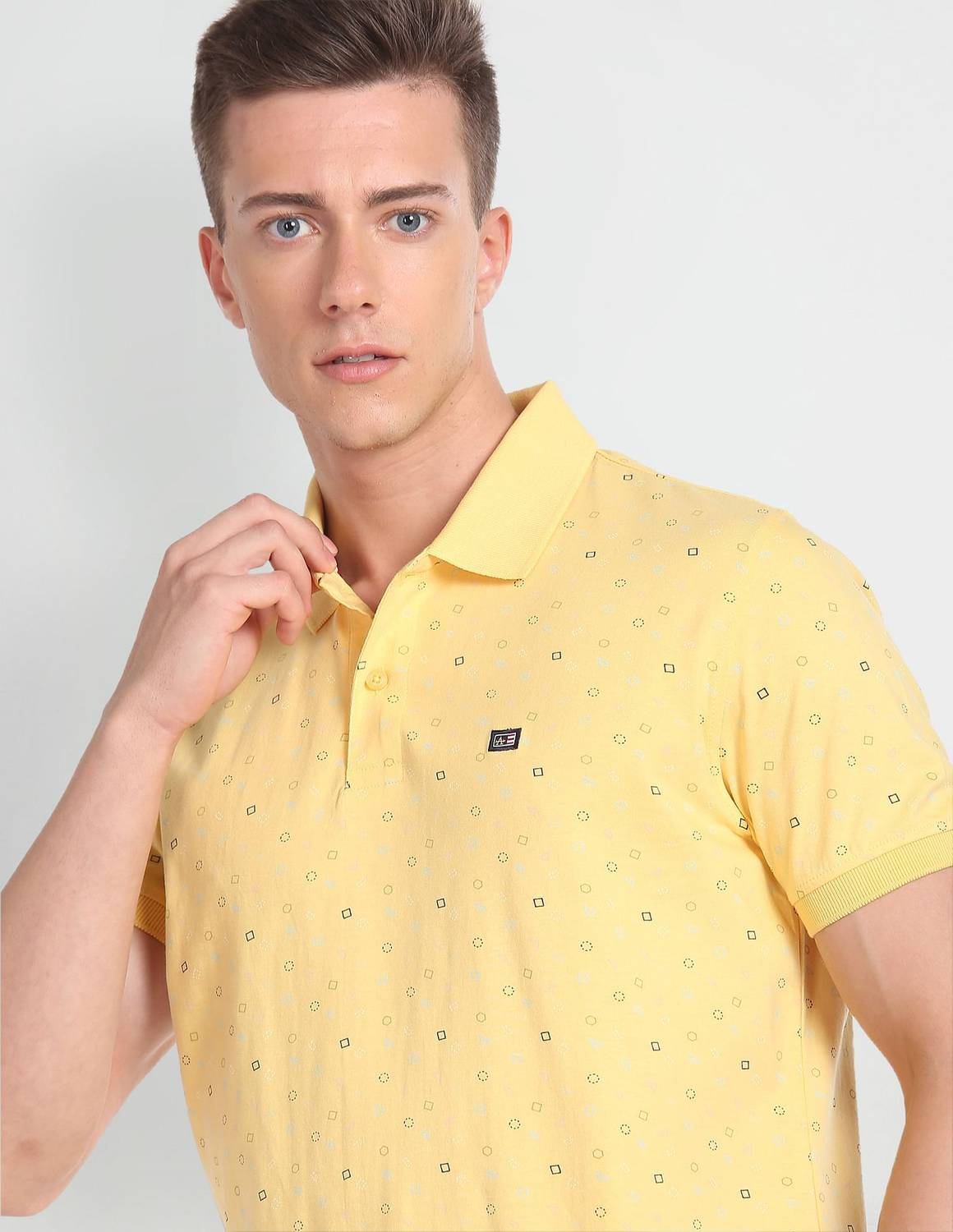 Arrow Sport Printed Men Polo Neck Yellow T-Shirt