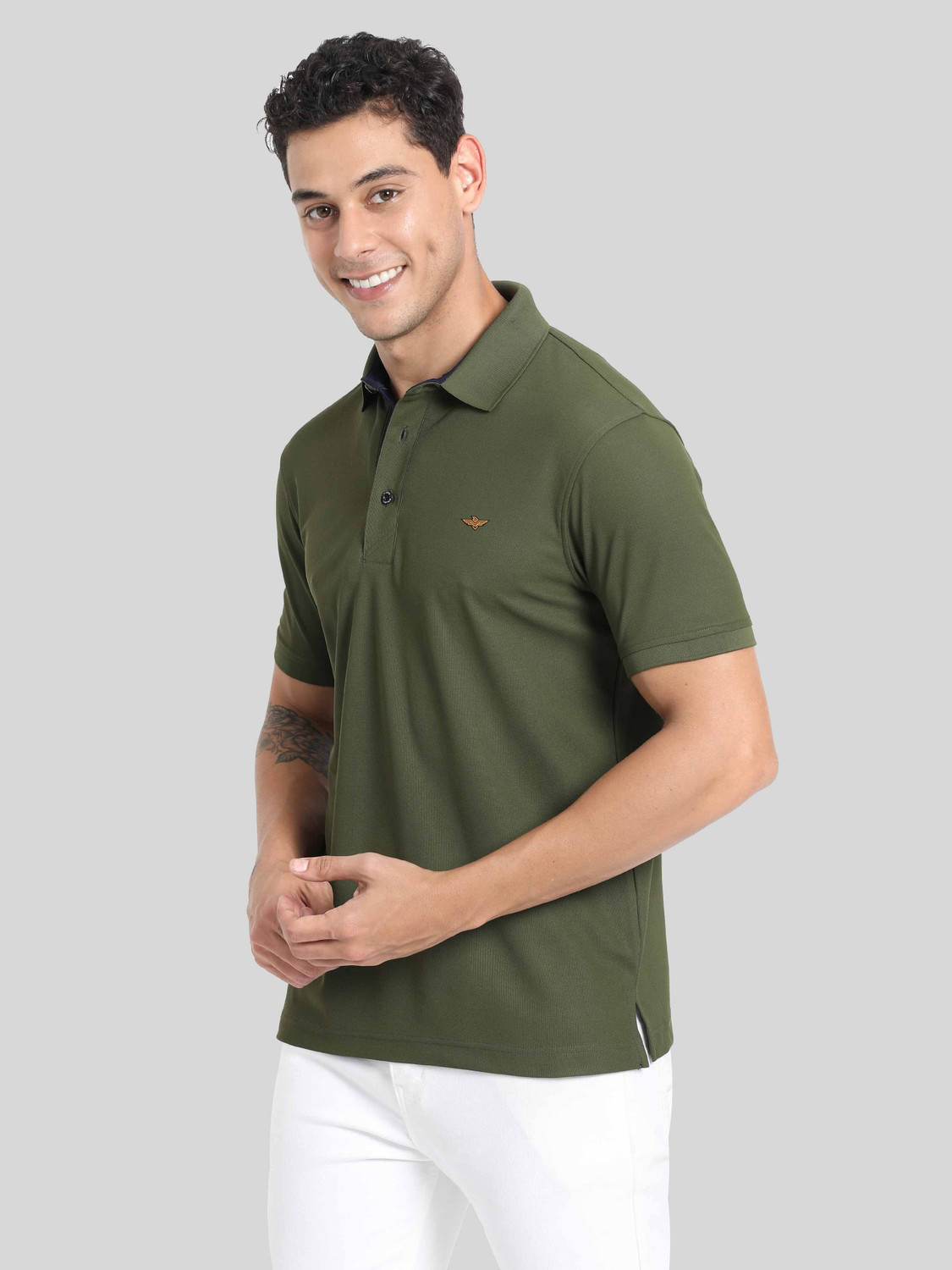 Image of Stellers Solid Men Polo Neck Dark Green T-Shirt