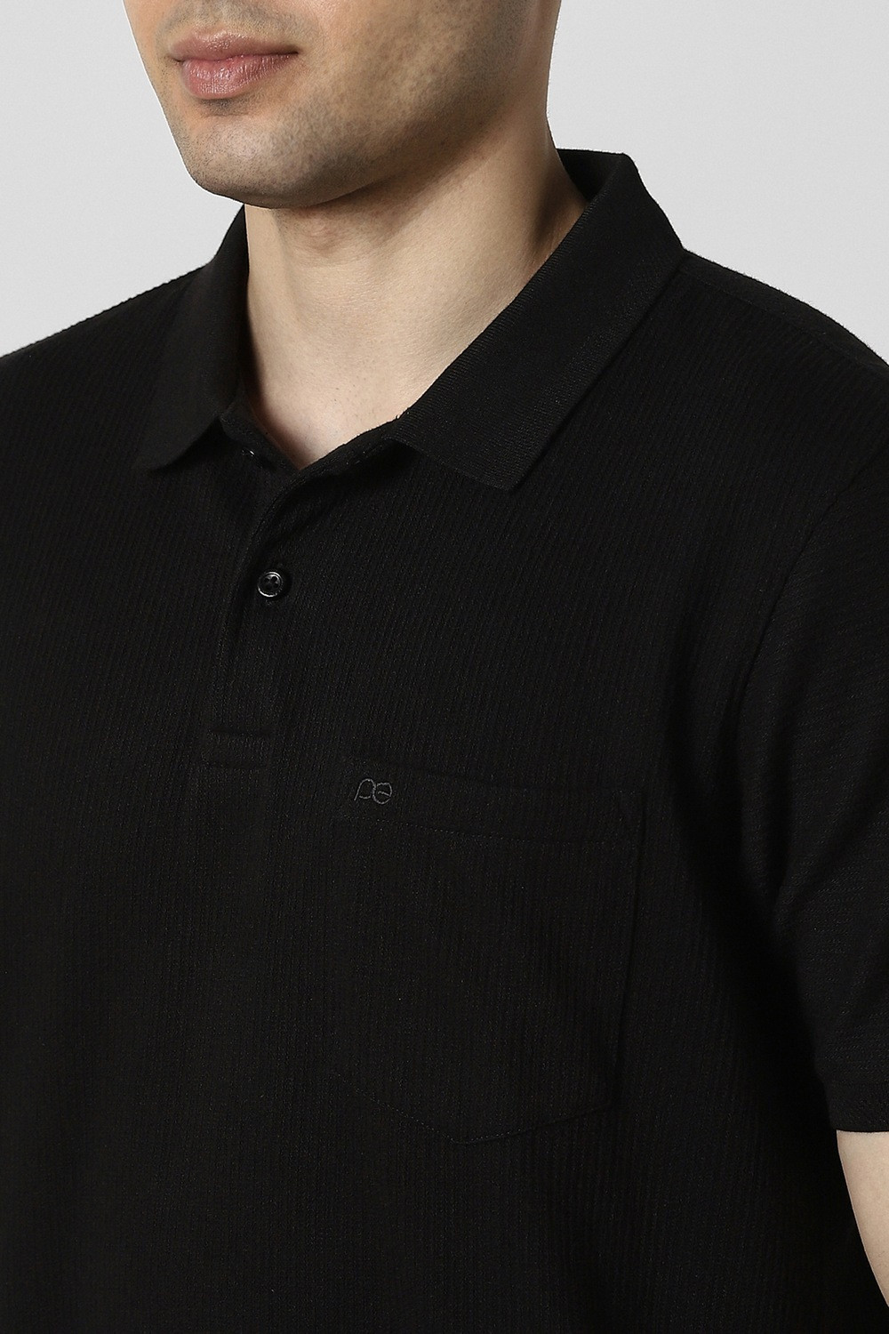 Image of PETER ENGLAND Solid Men Polo Neck Black T-Shirt