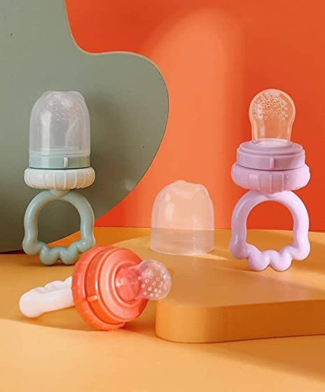 BabyGo Silicone Nipple Food Nibbler for Fruits with Rattle Handle Pack of 1 Teether and Feeder