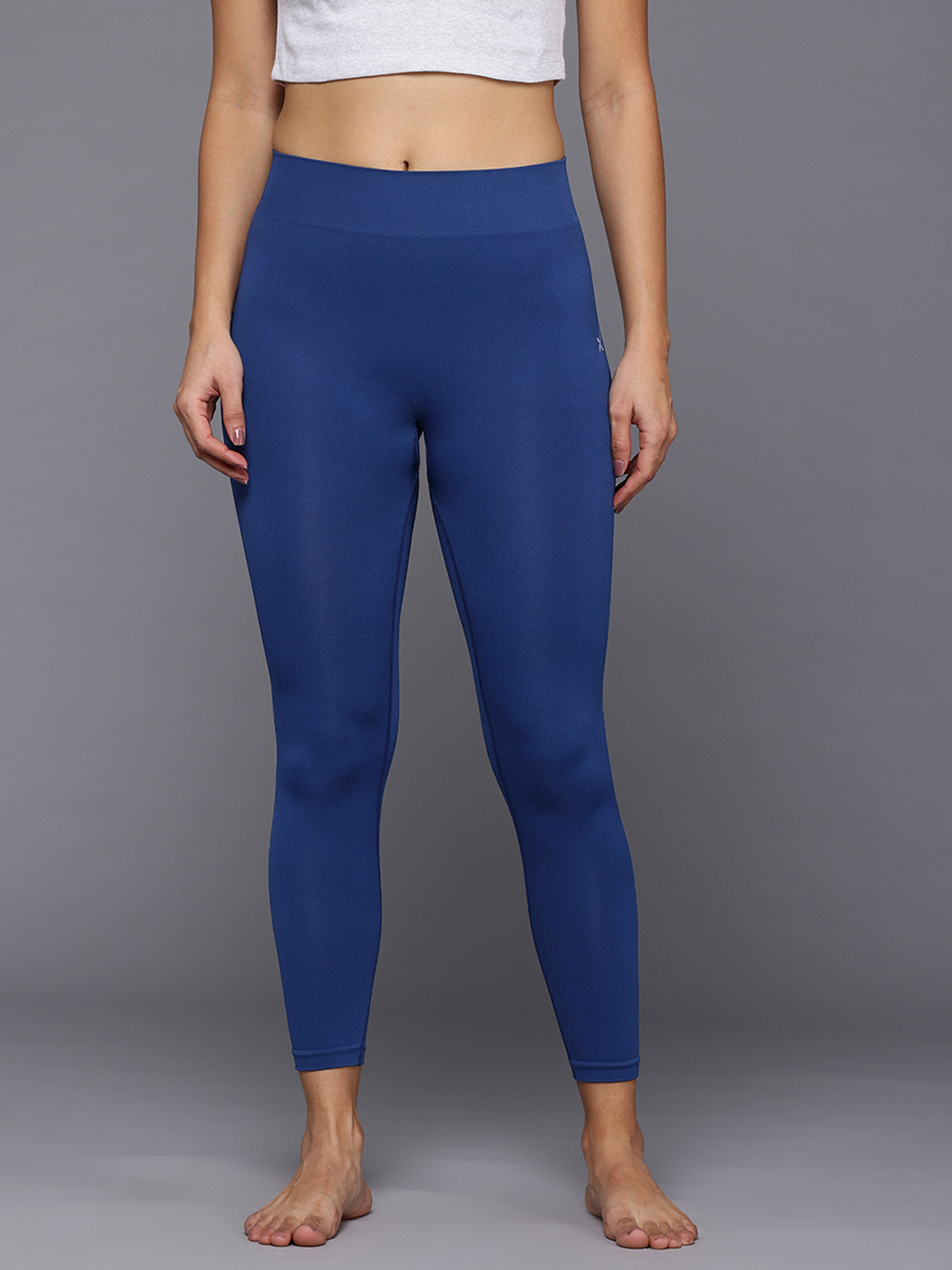 Image of HRX by Hrithik Roshan Solid Women Blue Tights