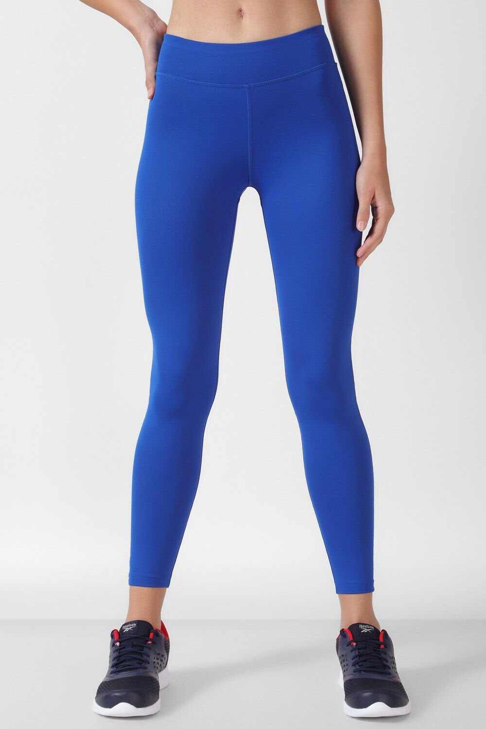 Image of REEBOK Solid Women Blue Tights