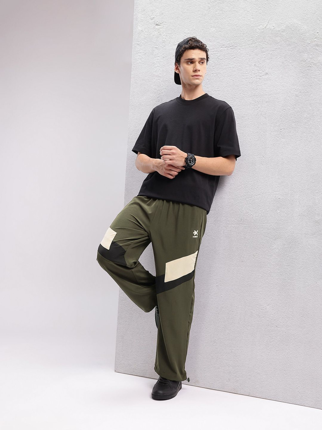 Image of HRX by Hrithik Roshan Solid Men Green Track Pants