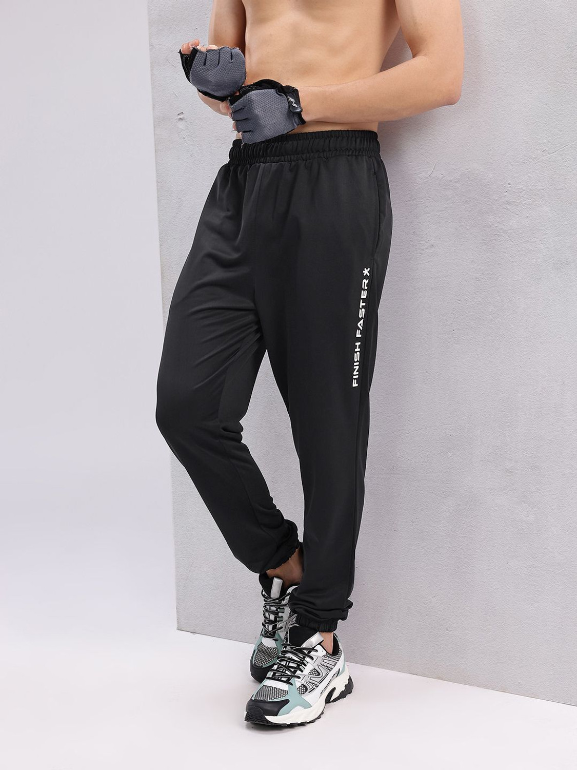Image of HRX by Hrithik Roshan Self Design Men Black Track Pants