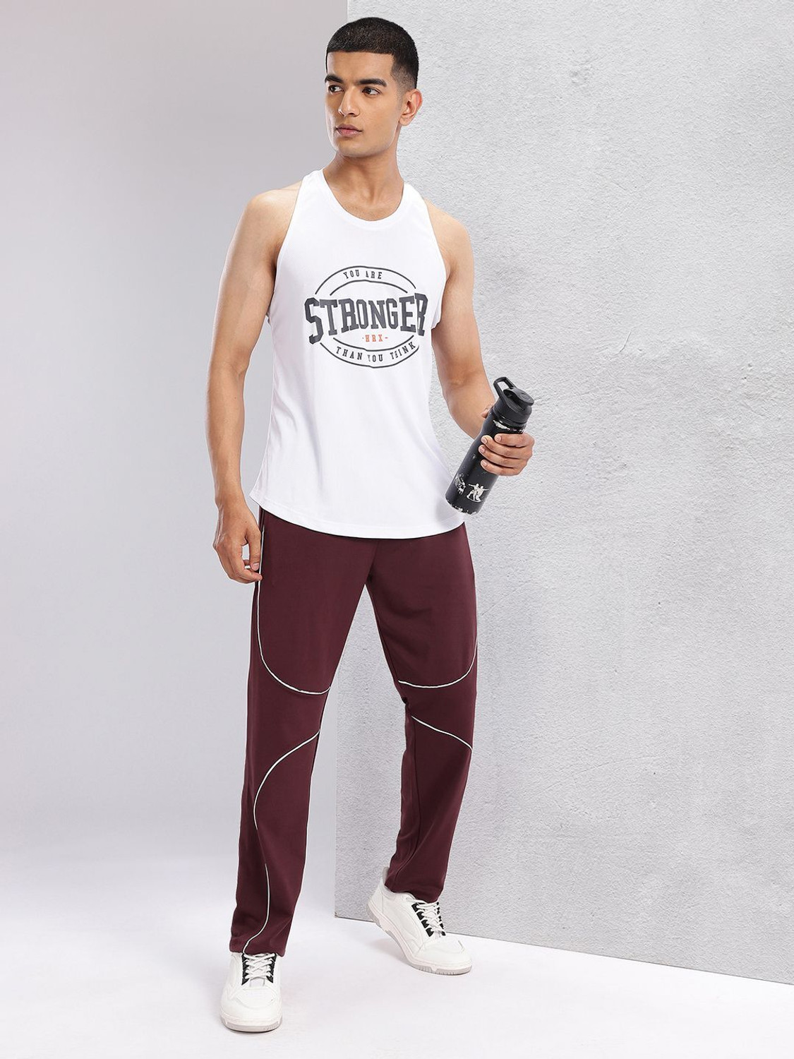 Image of HRX by Hrithik Roshan Striped Men Black Track Pants