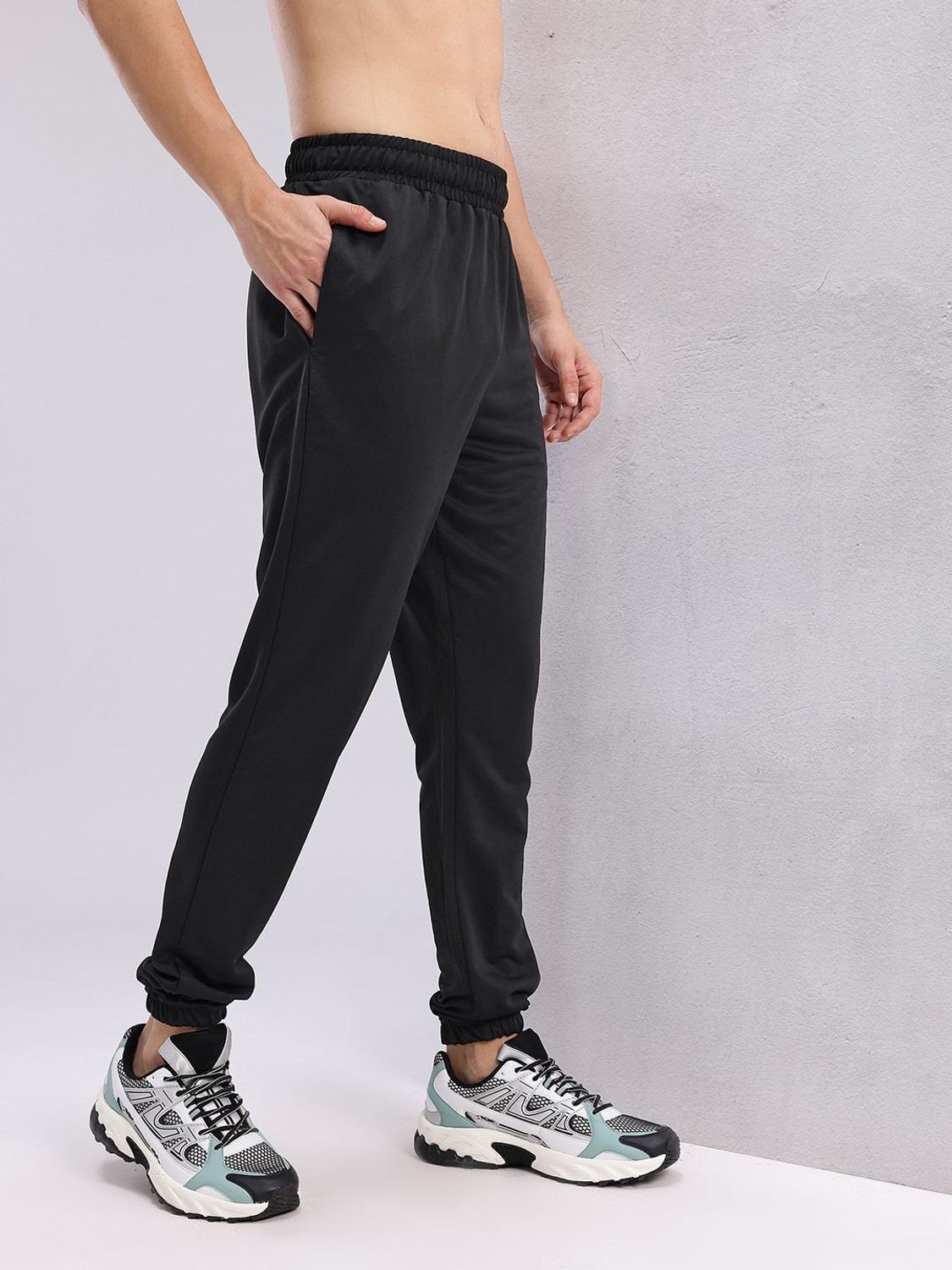 Image of HRX by Hrithik Roshan Self Design Men Black Track Pants