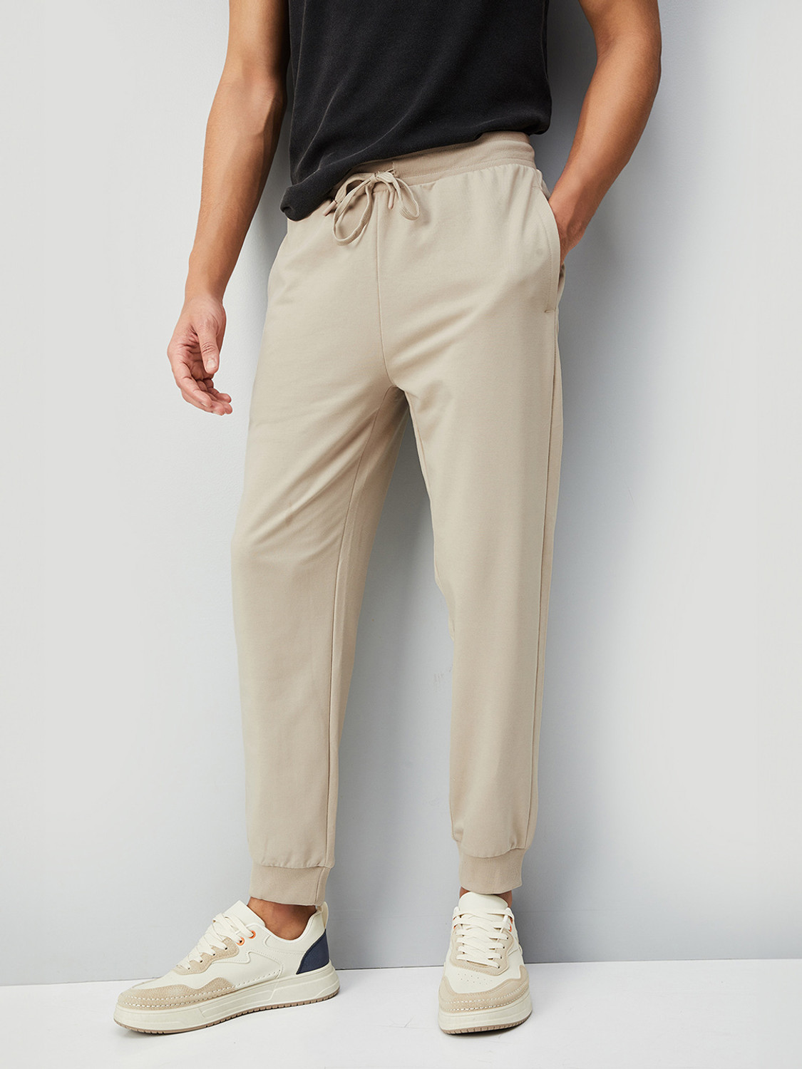 Image of MAX Solid Men Beige Track Pants