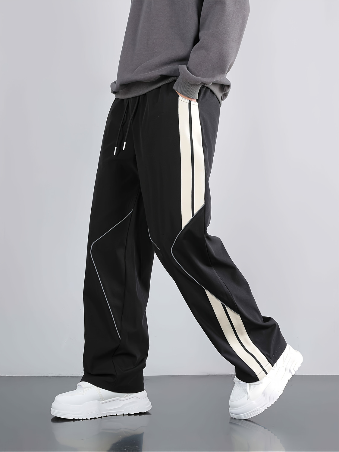 Image of JERKYN Striped Men Black Track Pants