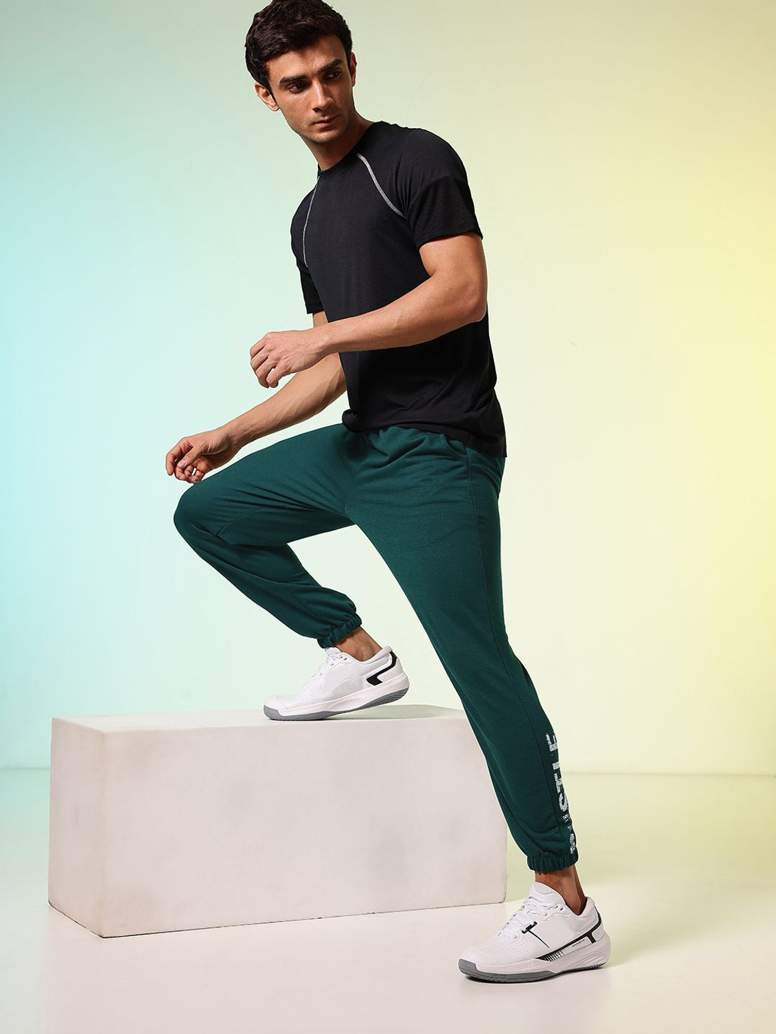 Image of HRX by Hrithik Roshan Solid Men Green Track Pants